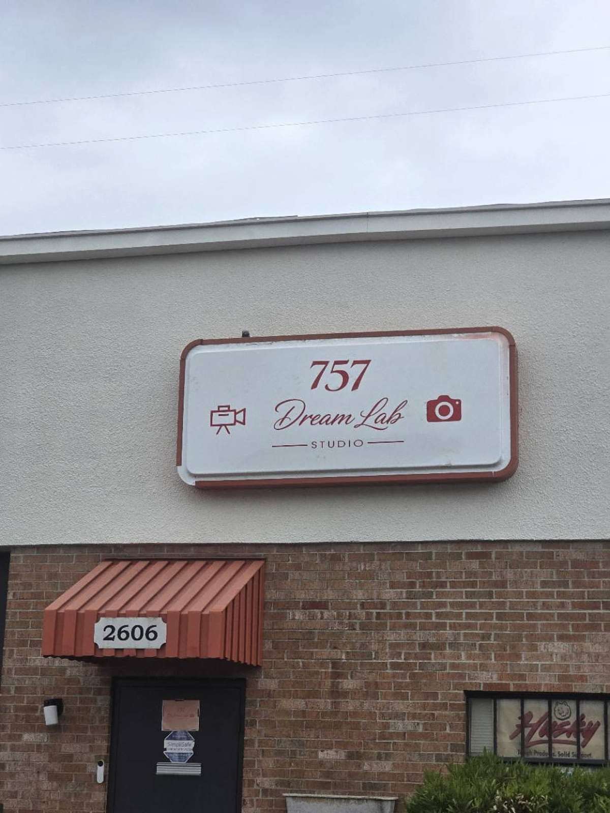 Current 757 Dream Lab Studio exterior showing the studio sign and 2606 entrance