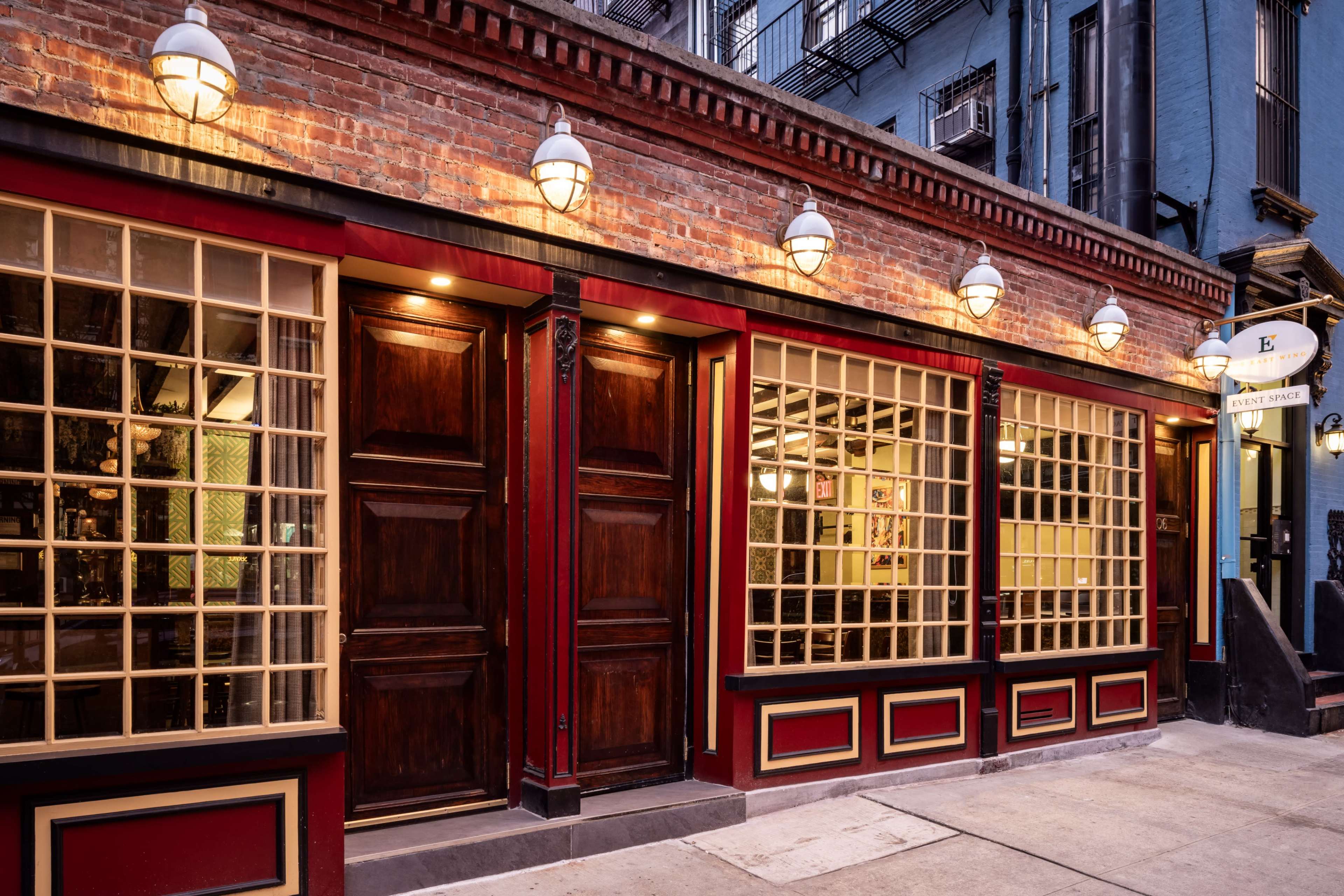 The East Wing - a mid-century bar set flooded with natural light Image in Lenox Hill, New York City, NY