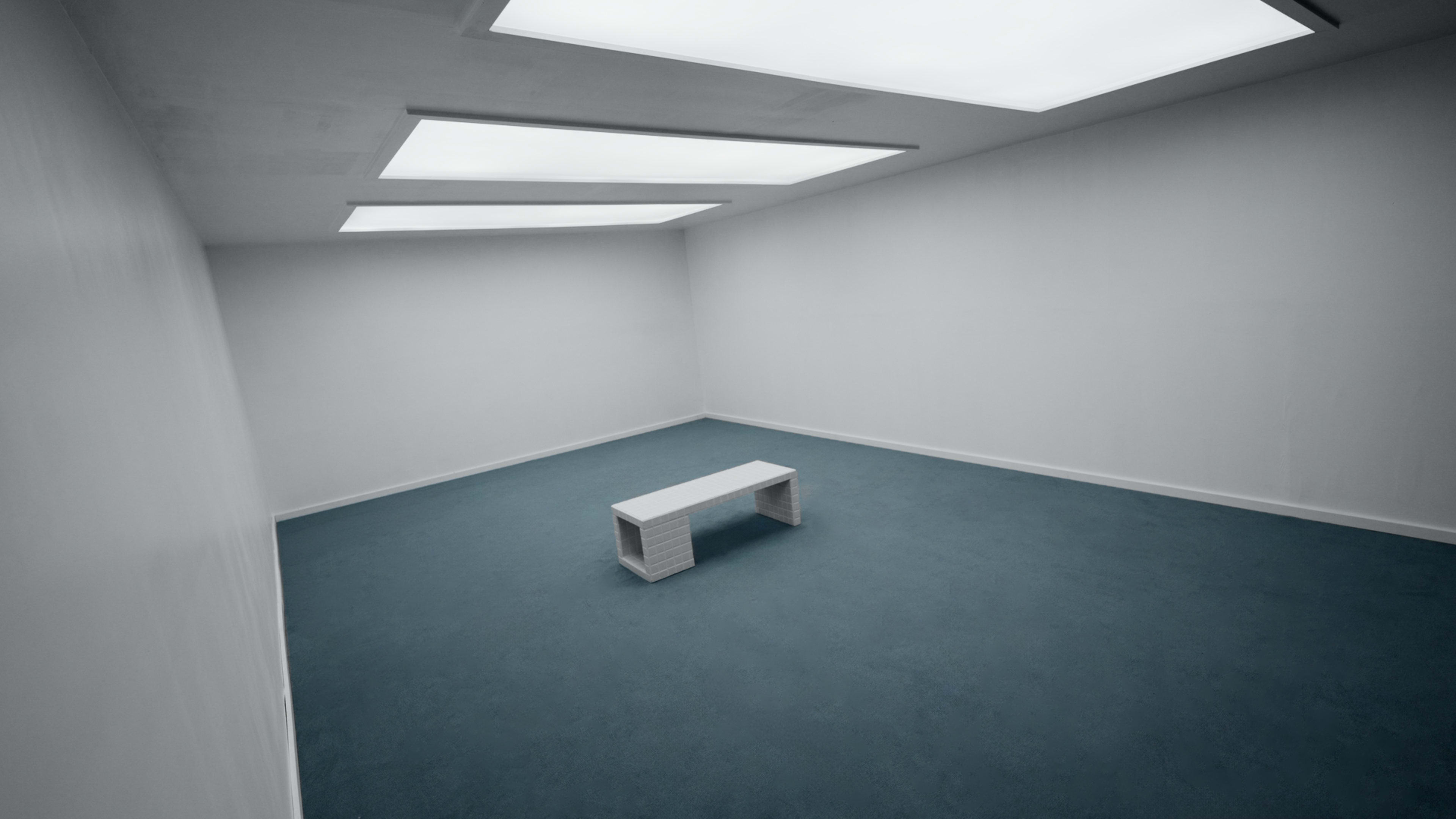 The image shows a sparsely furnished, empty room with a blue floor and a white bench in the center, illuminated by bright overhead lights.