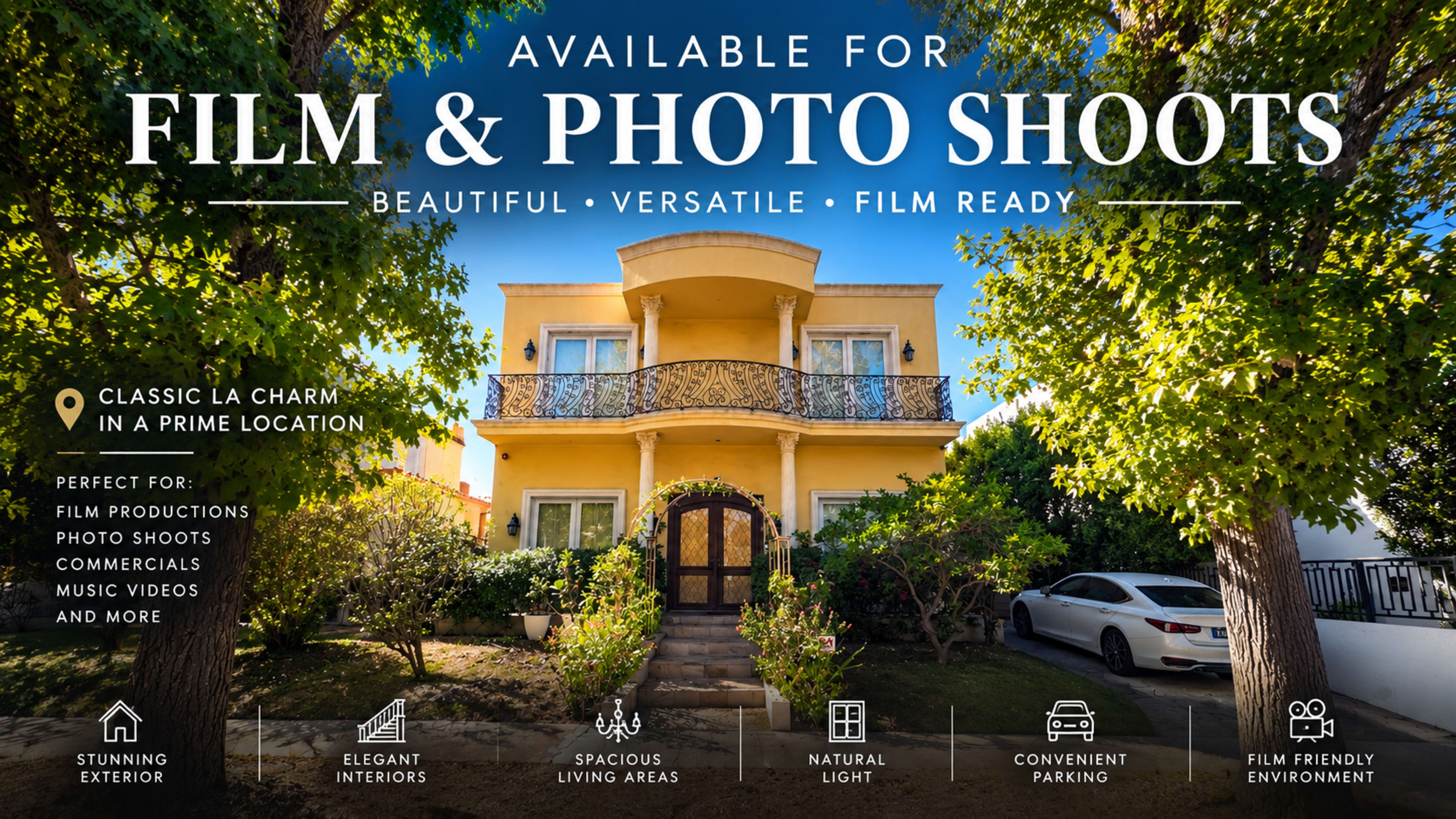 The image features a two-story yellow building surrounded by greenery, with a sign indicating it is available for film and photo shoots.