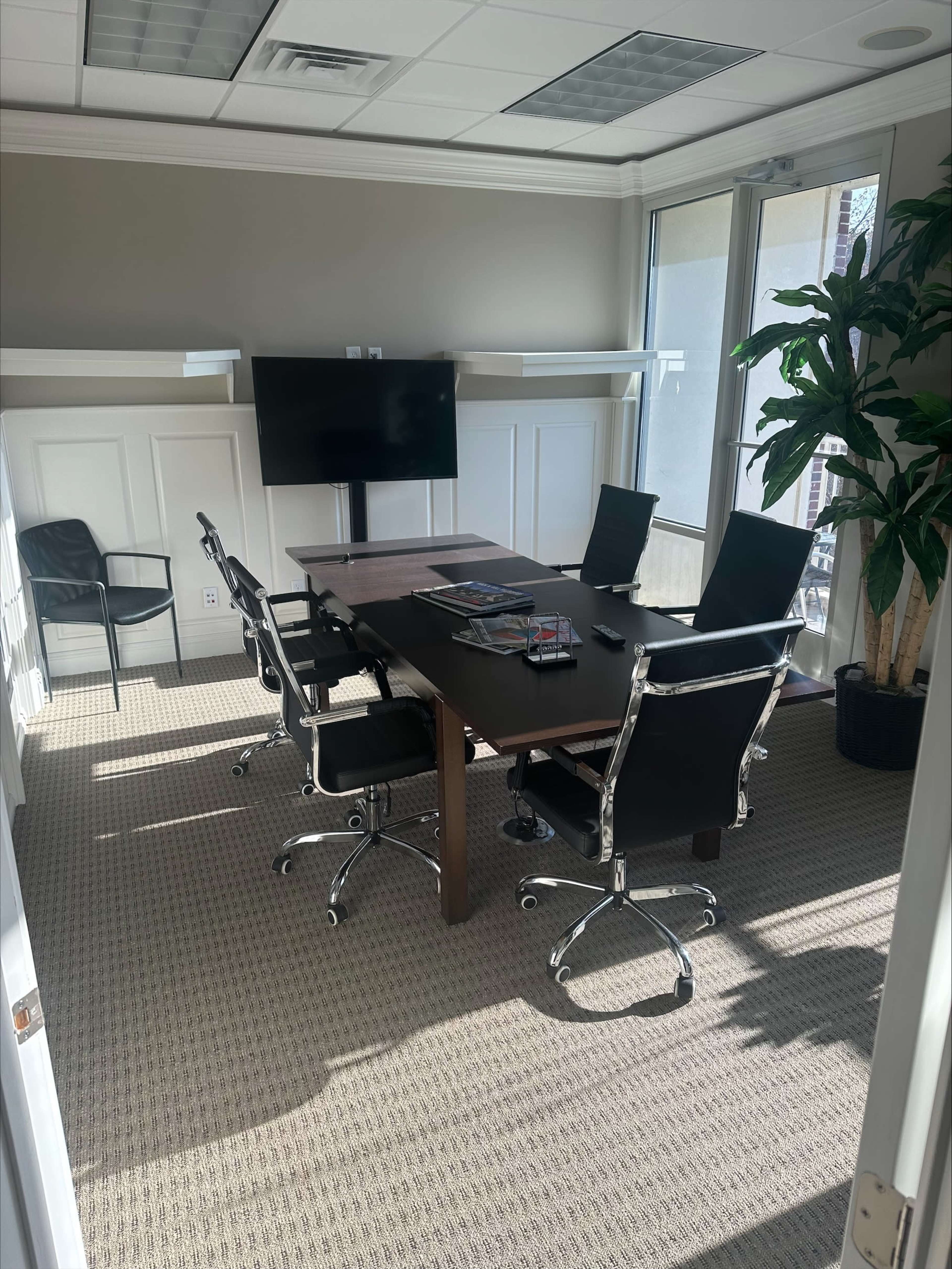 Newtown private office conference room with patio. Image in , Williamsburg, VA