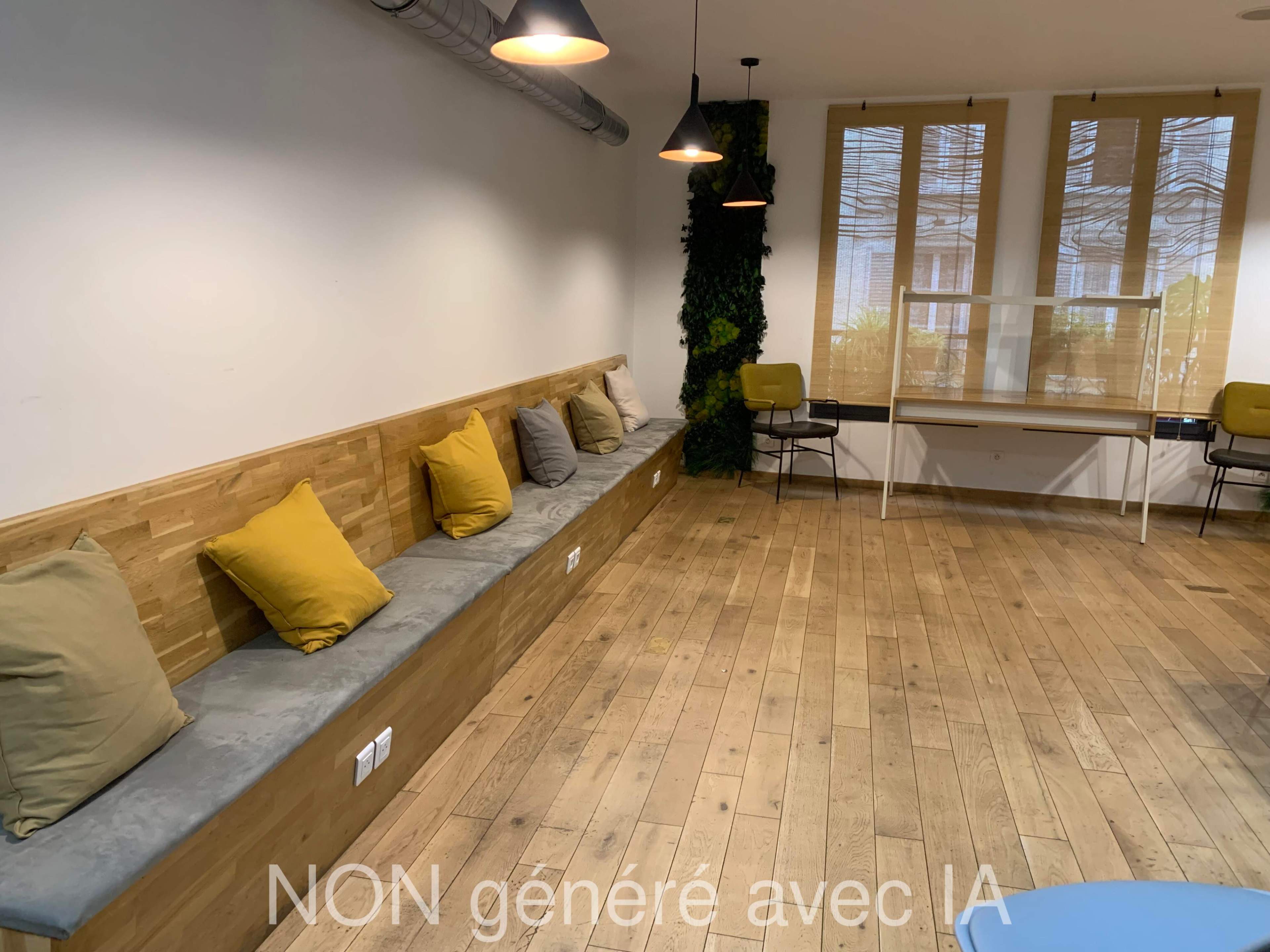 The image shows a modern interior space featuring a wooden bench with cushions, large windows, and minimalist decor.