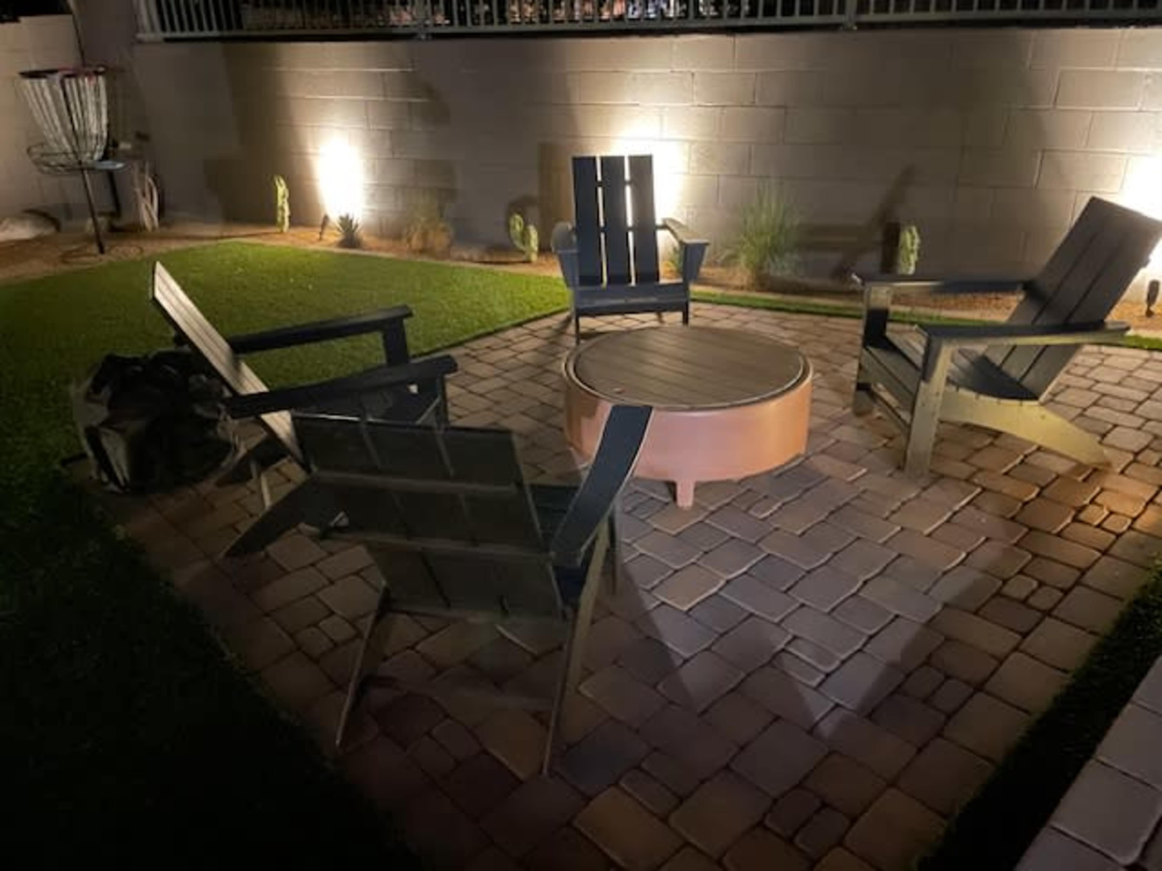 Newly renovated backyard with heated pool/spa, BBQ area and fire pit. Image in Emperor Estates, Queen Creek, AZ