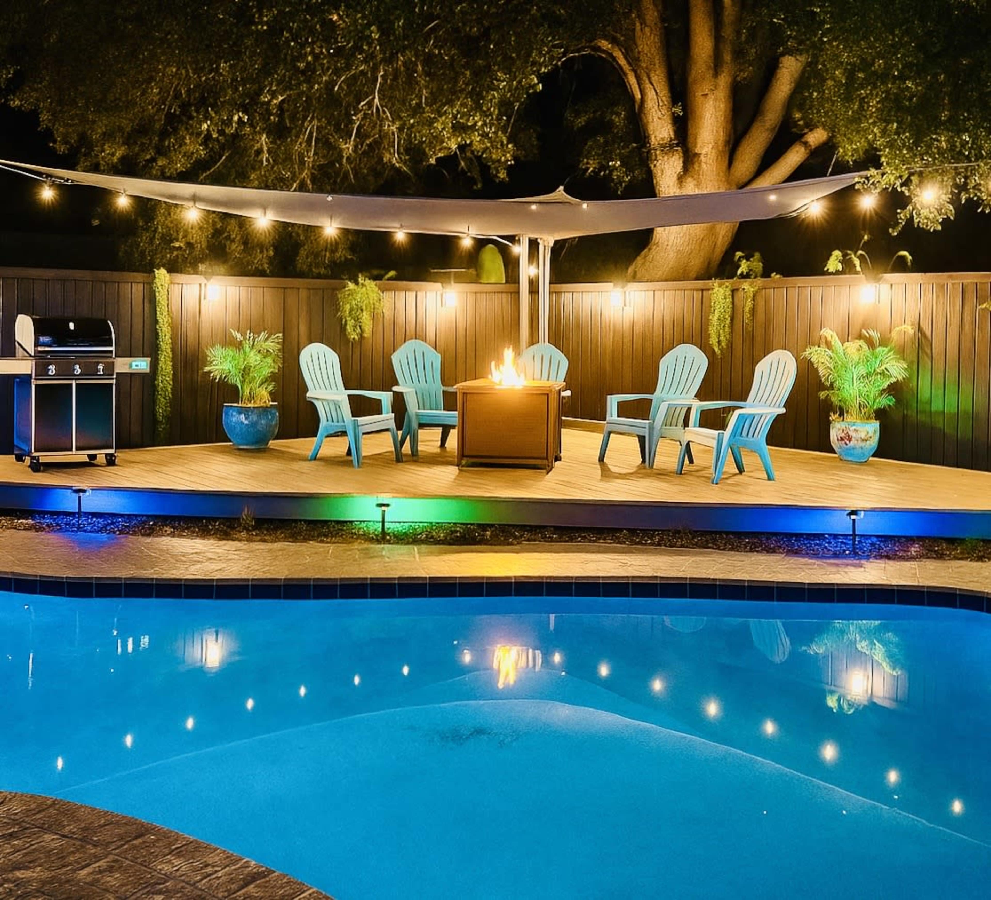 Backyard in a family friendly neighborhood with a RV,  hot tub and TV deck fire pit area Image in Goldenrod, Winter Park, FL