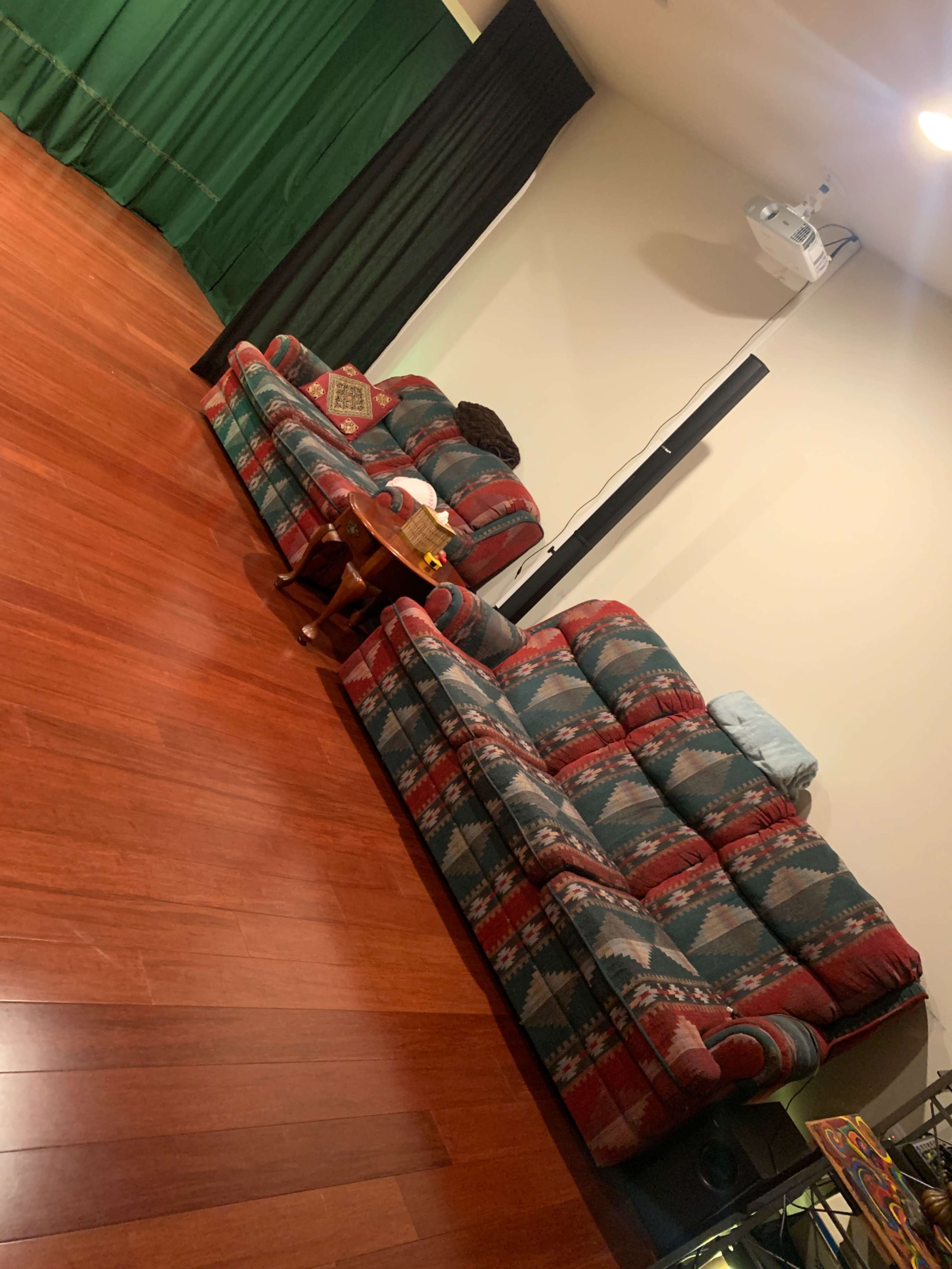 Entertainment room with continuous floor space and backdrop curtain Image in Maple Lawn, Fulton, MD