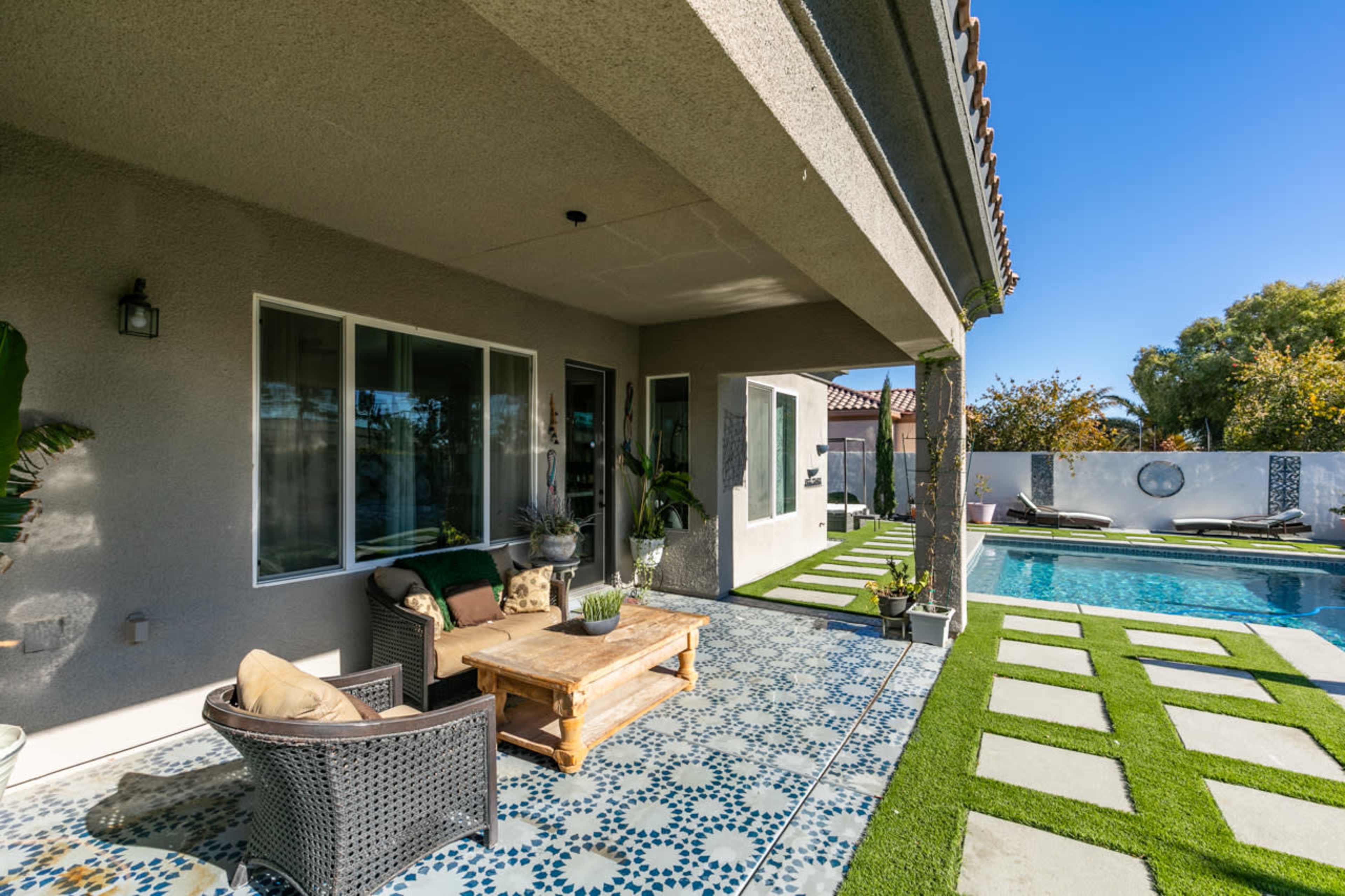 Whimsical Private backyard with pool , patio, fire pit in quiet North West Las Vegas neighborhood. Image in Wyeth Ranch, Las Vegas, NV