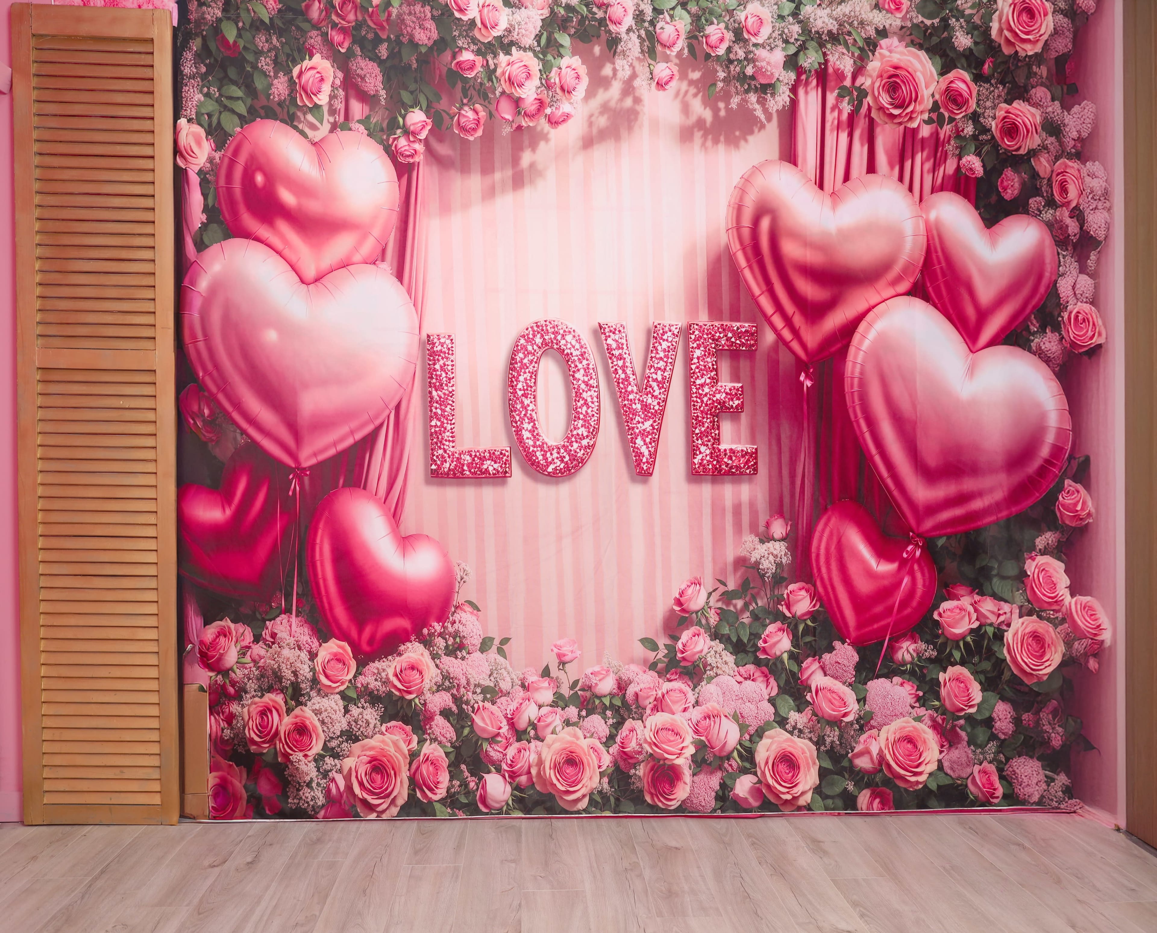 The image features a decorative backdrop with pink hearts and the word "LOVE" in sparkling letters, surrounded by pink roses.