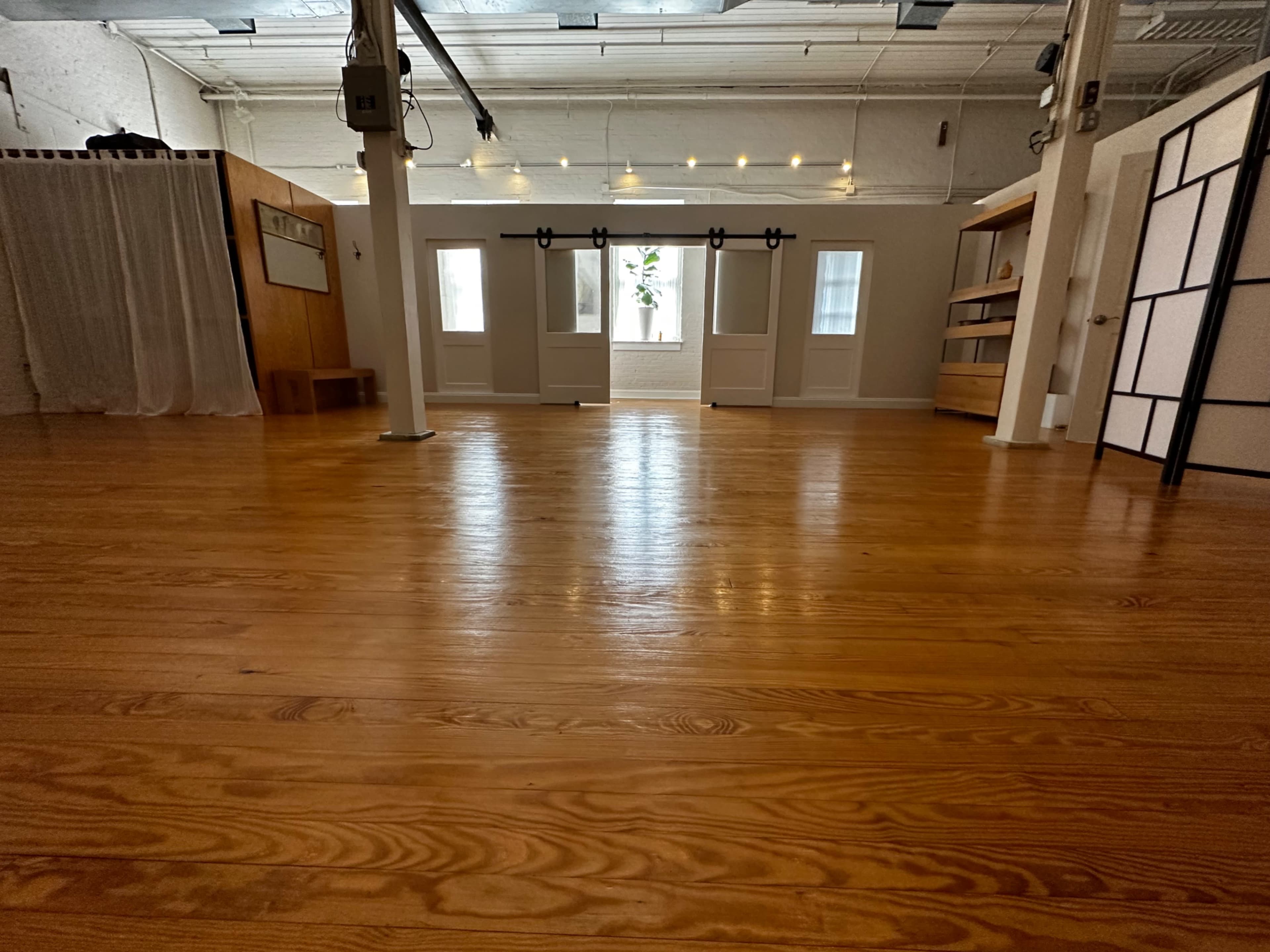 A stunningly warm & light filled industrial space in a novel location. Image in Hampden, Baltimore, MD