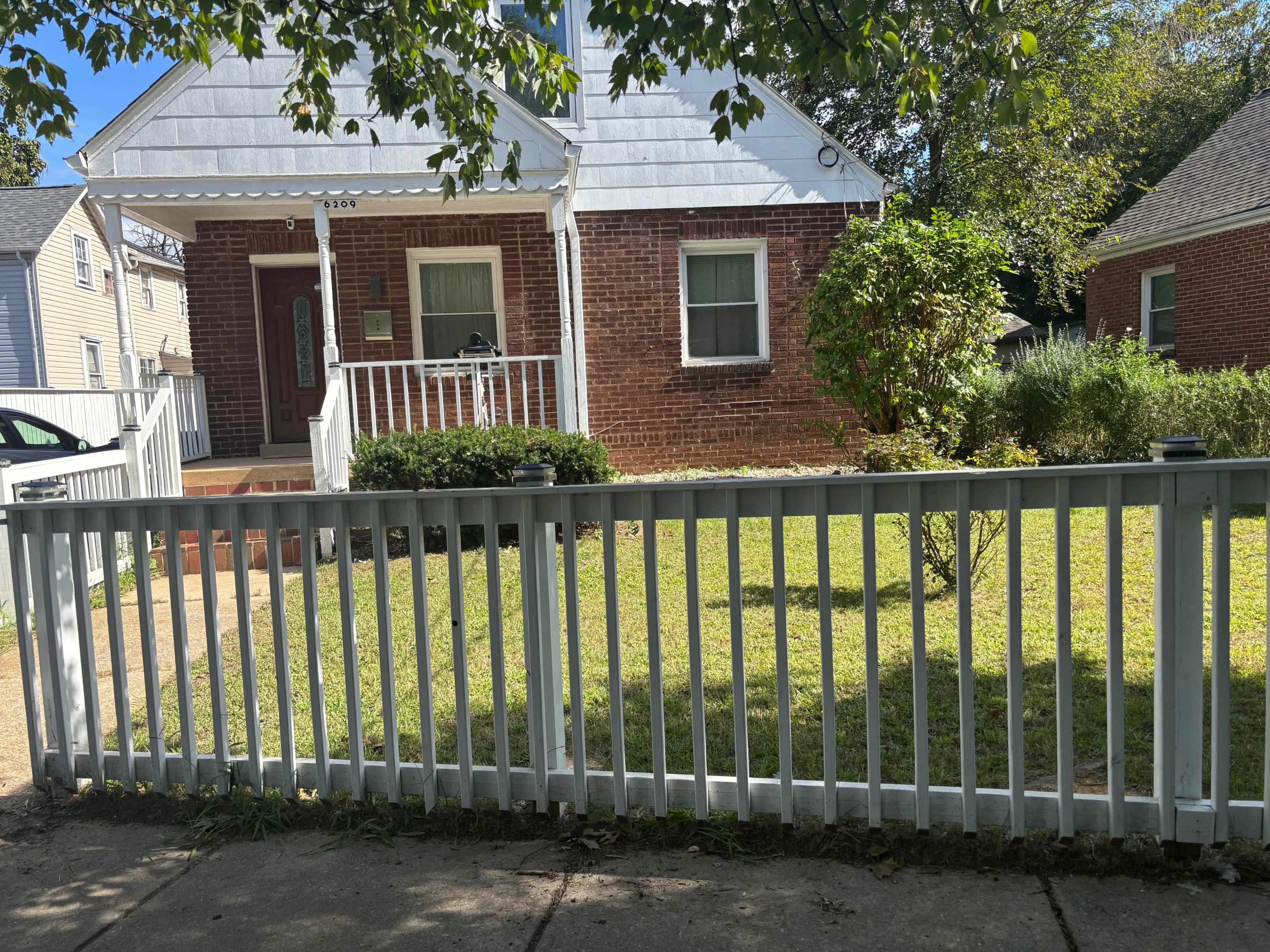 Urban and Artsy Open Floor Living Room and Kitchen Space with Great Natural light Image in Riverdale Park, Riverdale, MD