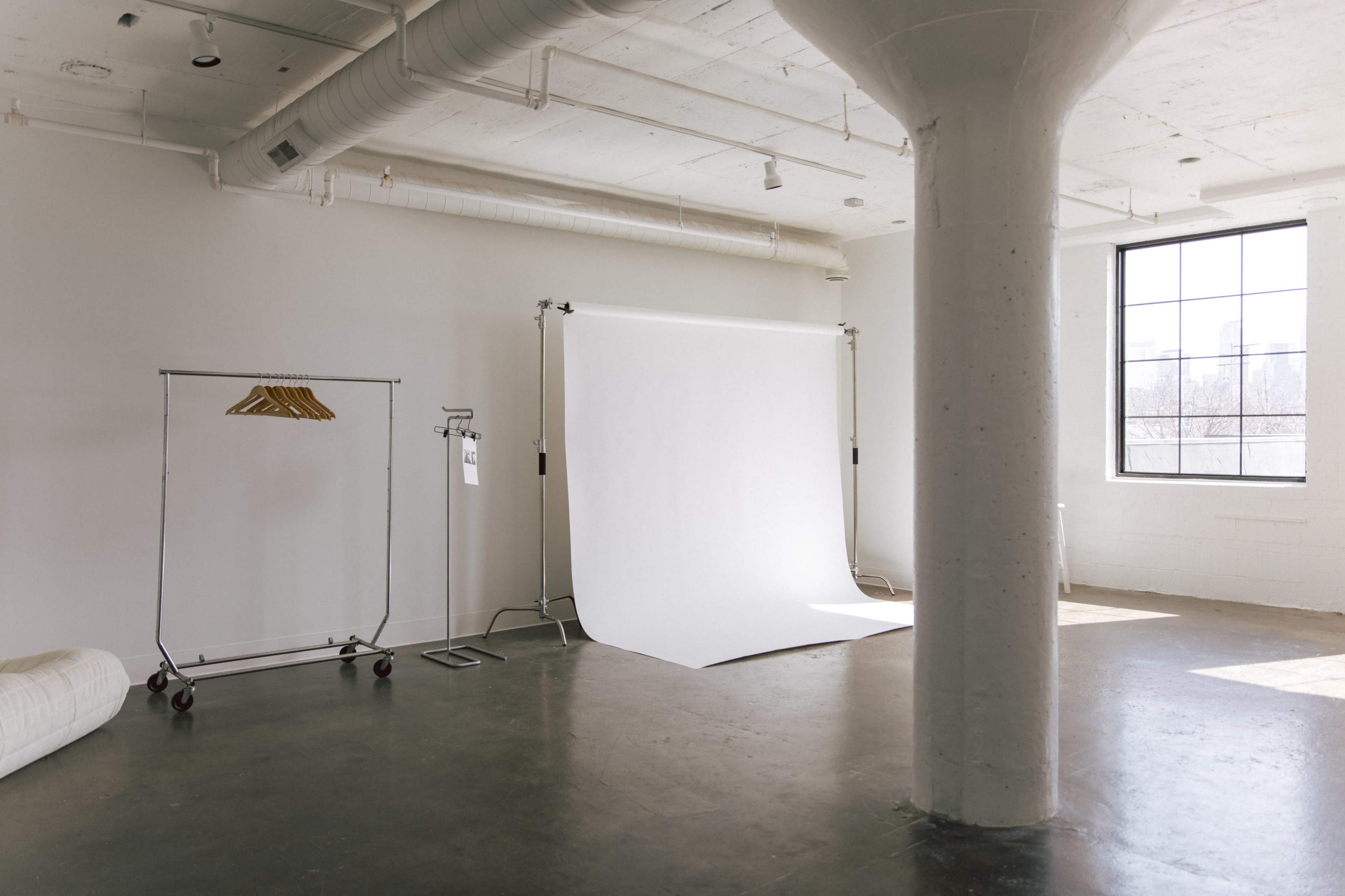 Modern Sunny Natural Light Photo Studio with City View Image in Near North, Minneapolis, MN
