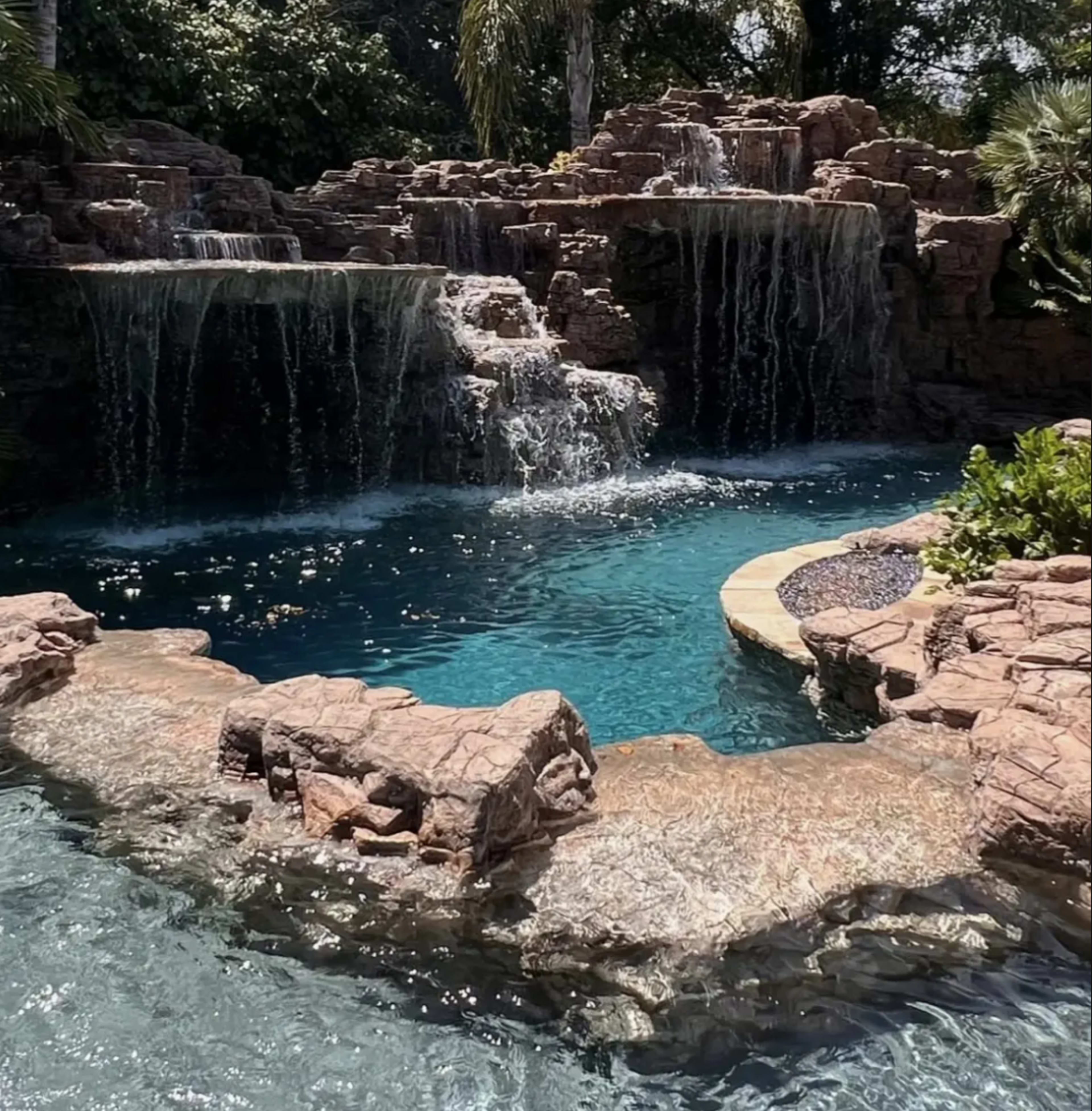 Beautiful Vegas type pool with waterfall and hot tub. Image in Valley Village, Valley Village, CA