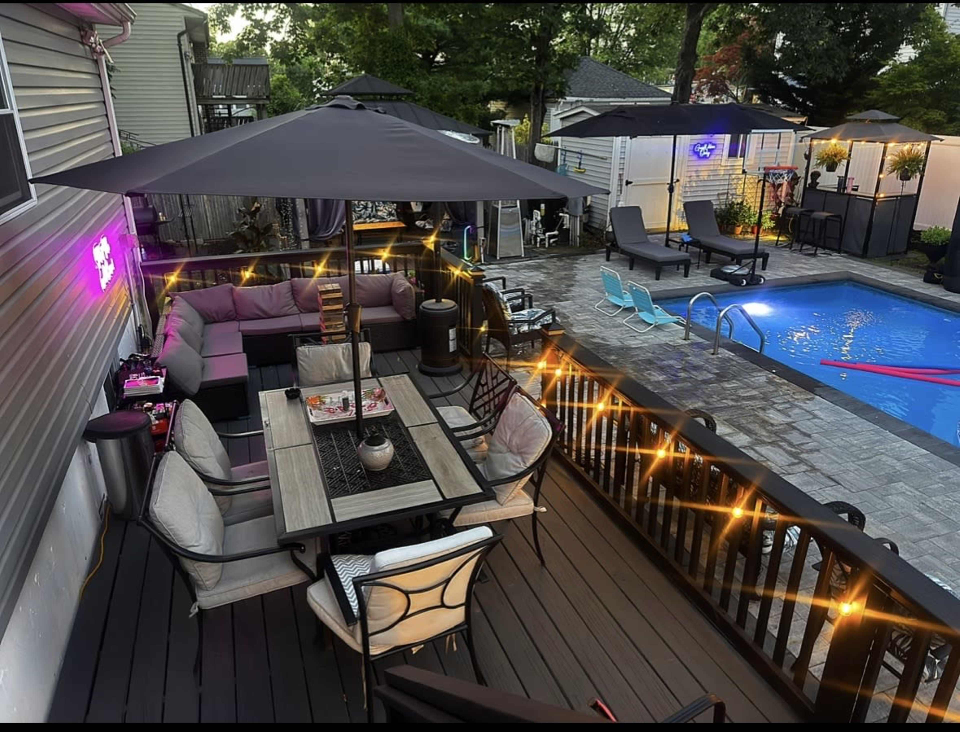 Private Resort-Style Backyard with Heated Pool & Cinema Image in Islip, Bayshore, NY