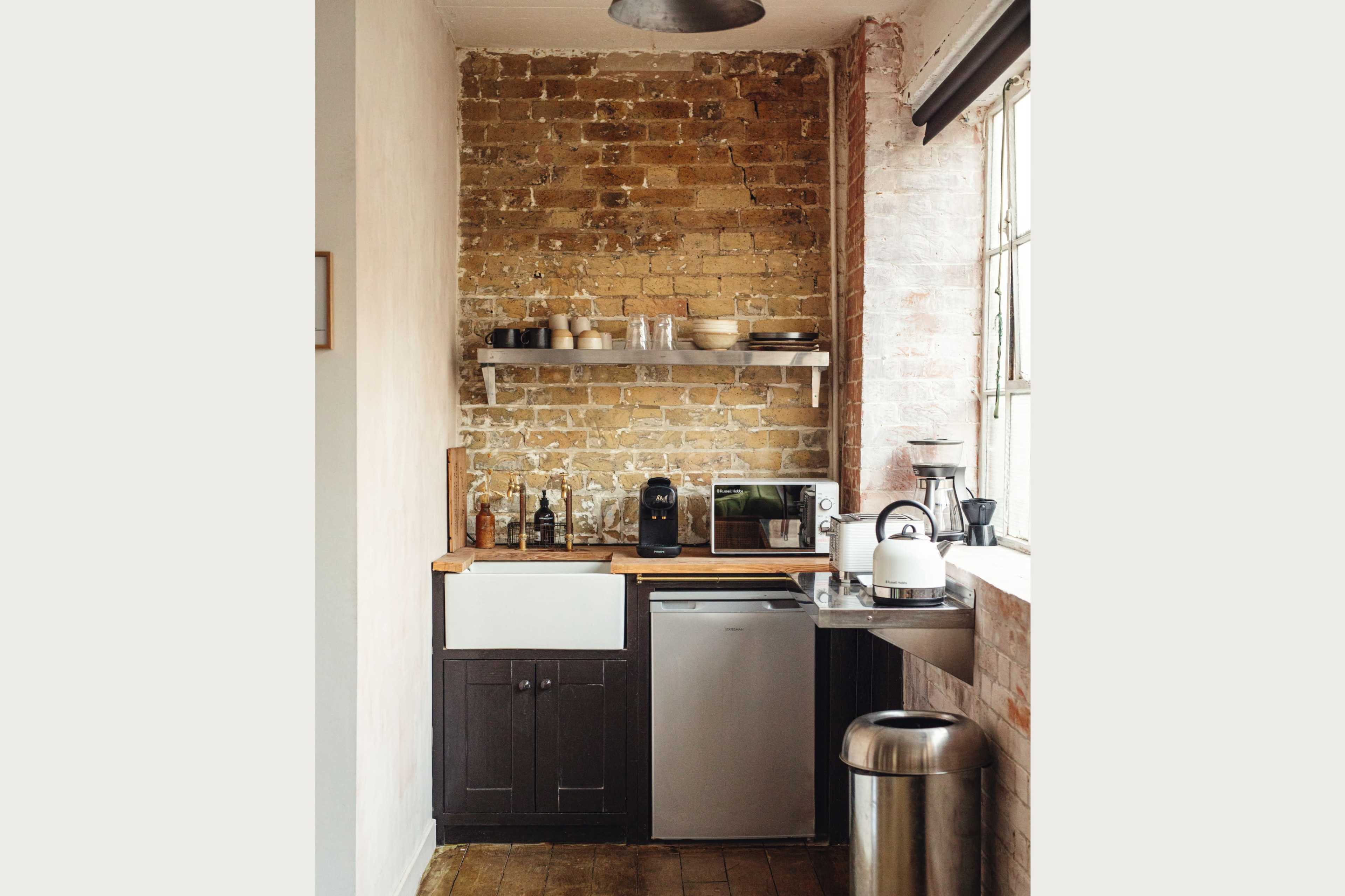 Warehouse Space with Wooden Floor and Brick walls Image in Dalston, london, ENG
