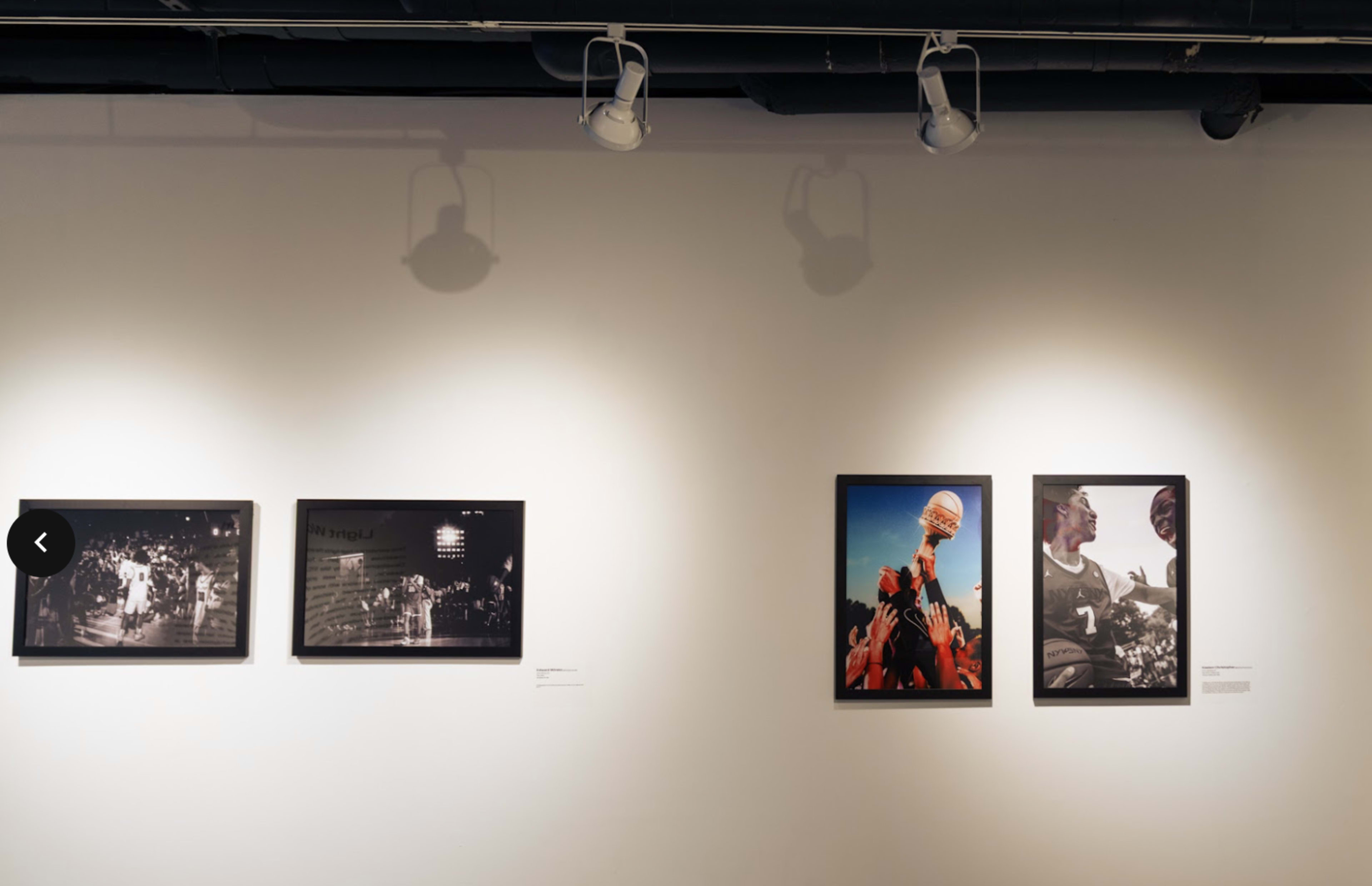 The image shows a gallery wall featuring four framed photographs, with two images on the left side in black and white and two colorful images on the right side.
