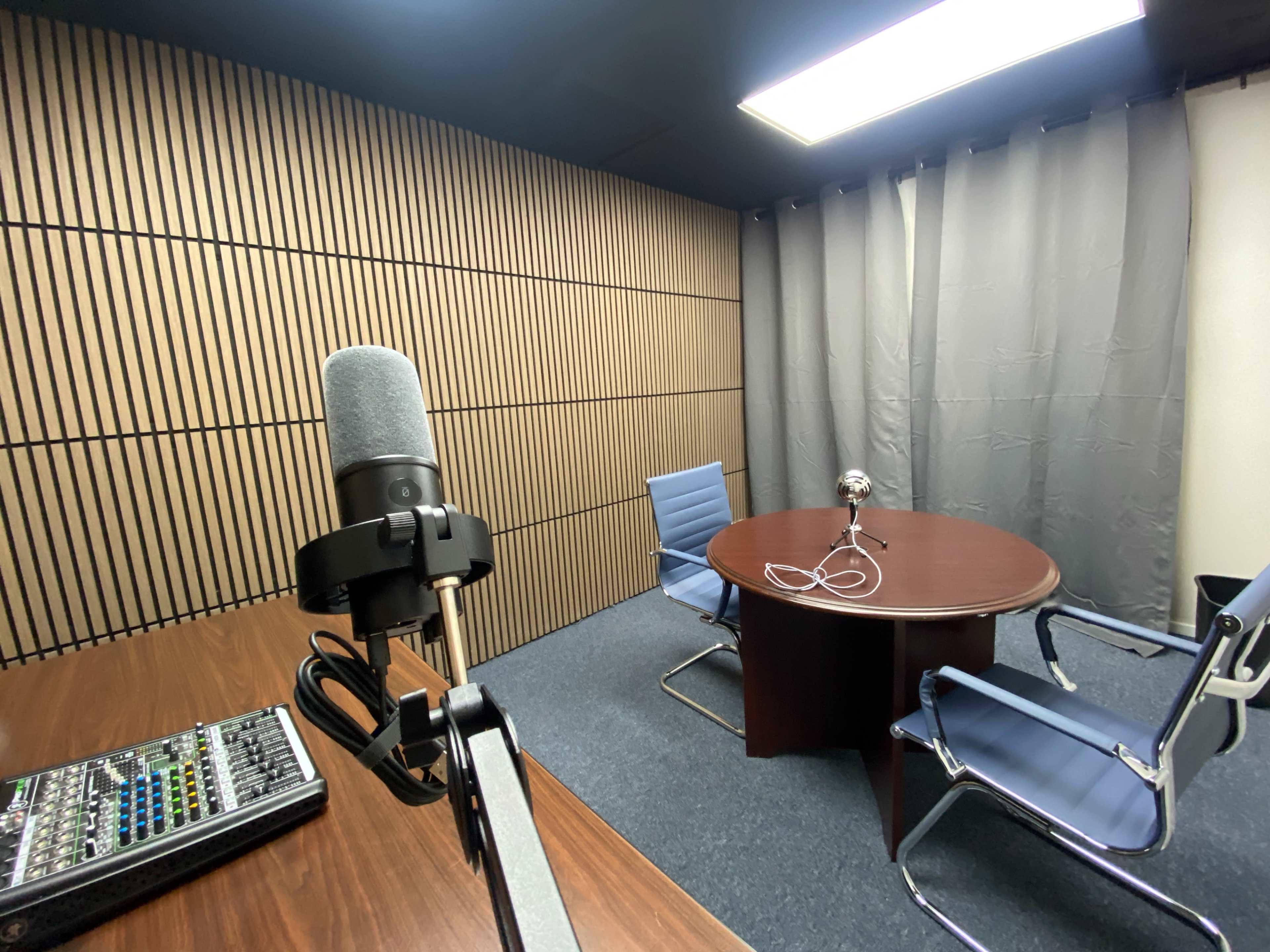 Podcast room equipped with mic and TV Image in Vance Jackson, San Antonio, TX