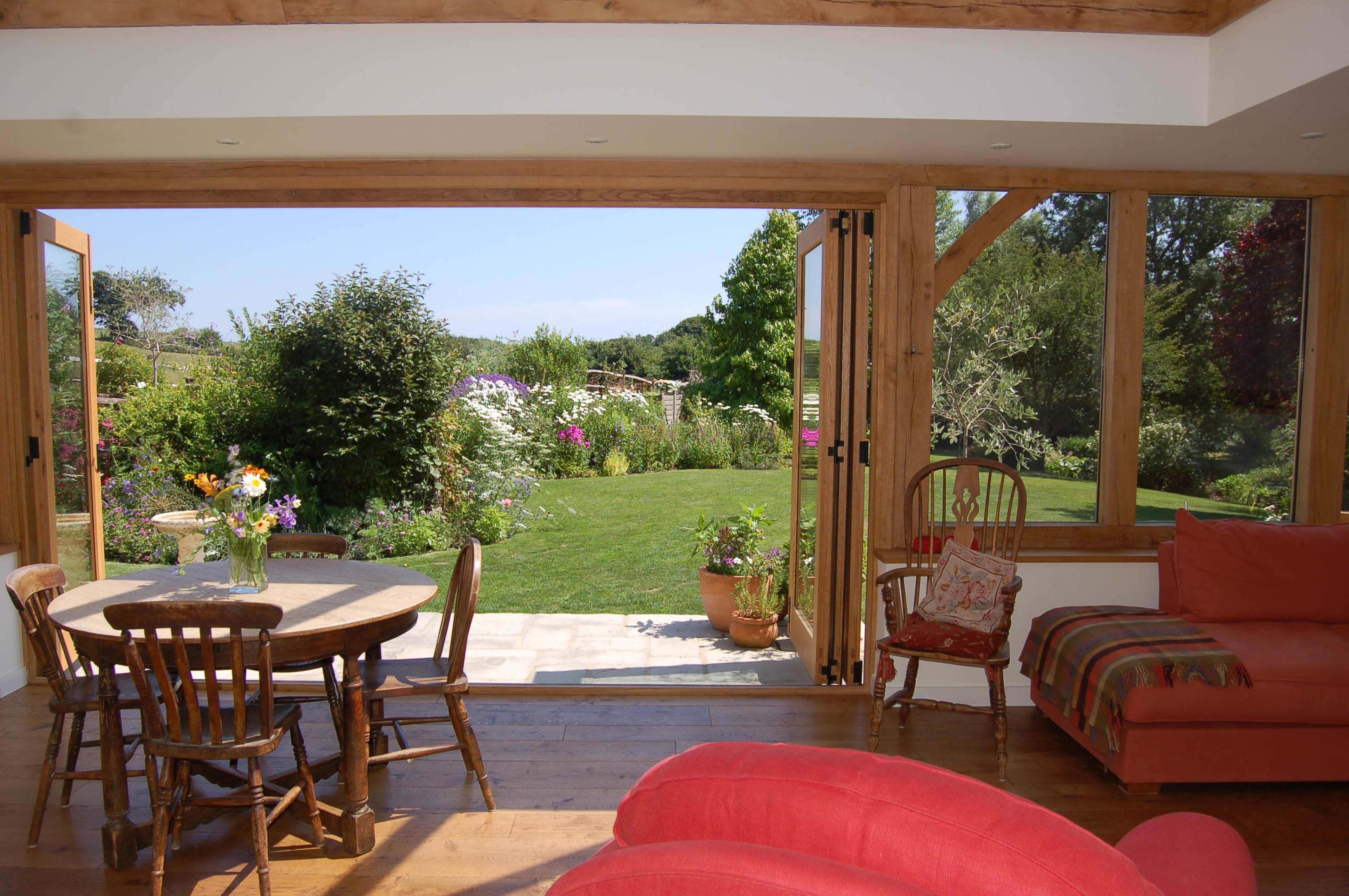 English Country Gardens with 17th century timber framed Sussex farmhouse. Image in Barcombe, Barcombe, ENG