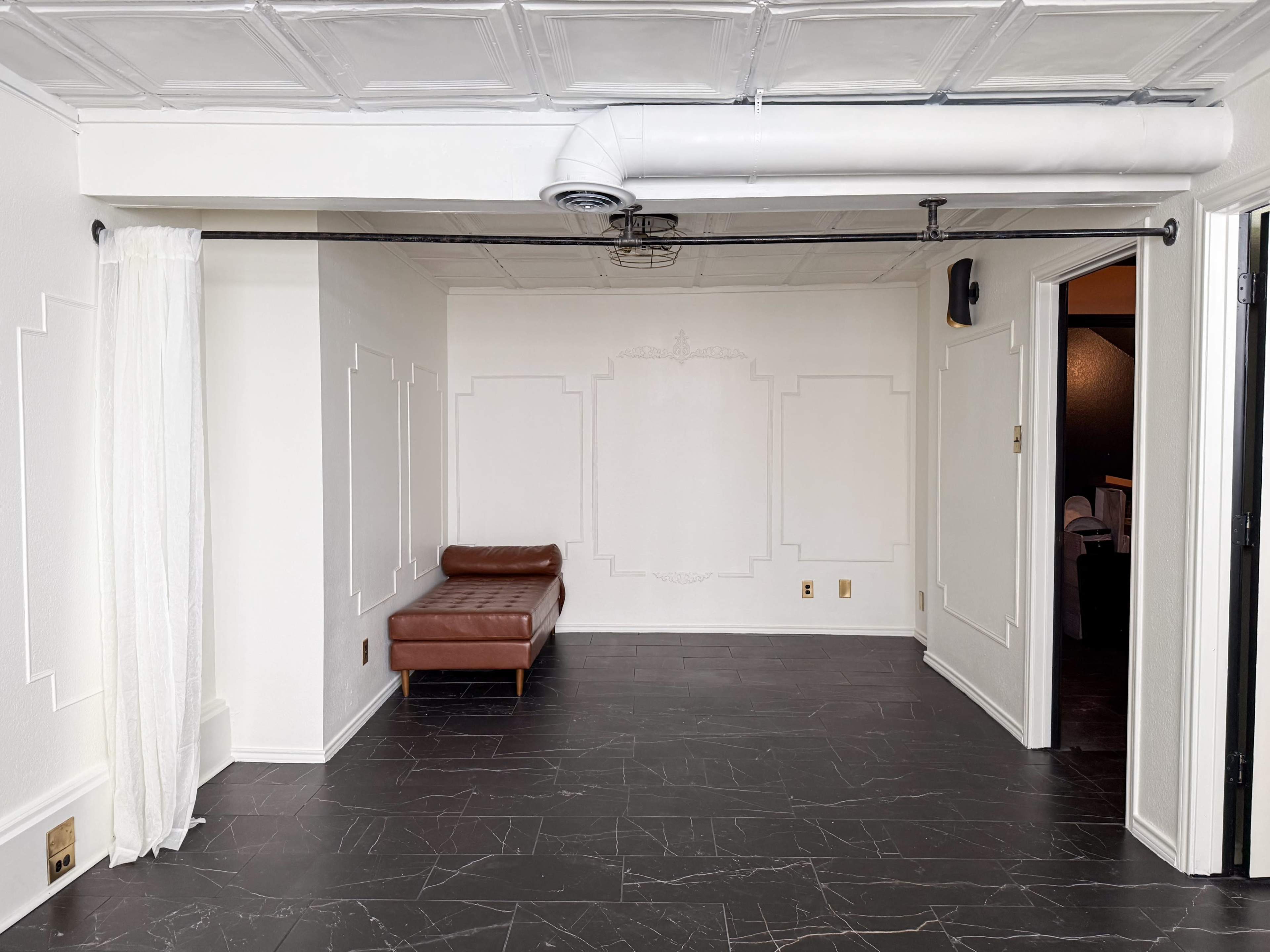 The Parisian Parlor at Archive Haus | a Natural Light all white European Style Studio Steps from the Denton Square Image in Denton, Denton, TX