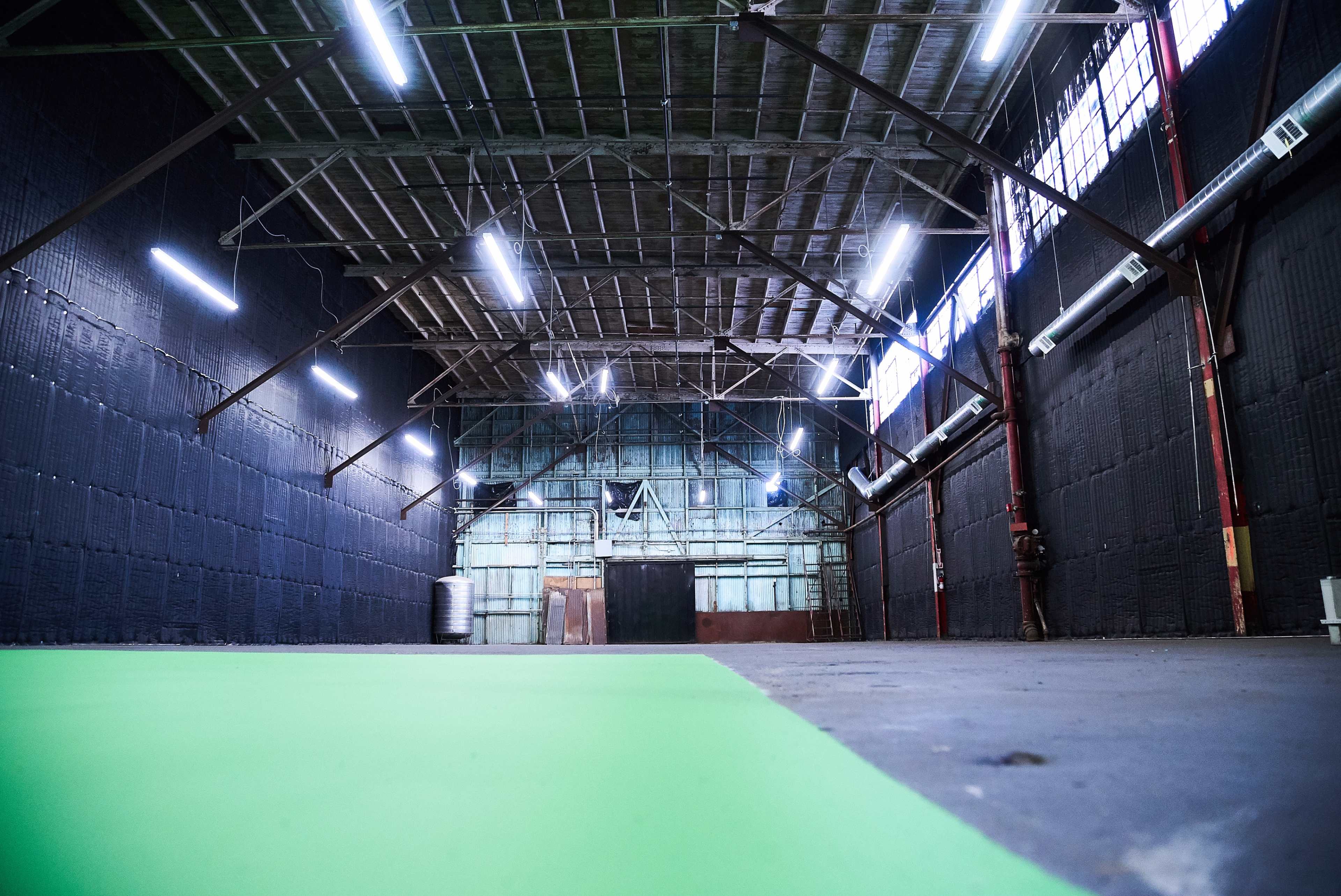 Grand Warehouse Studio + Green Screen CYC Wall fitted with Soundproofing Image in South Los Angeles, Los Angeles, CA