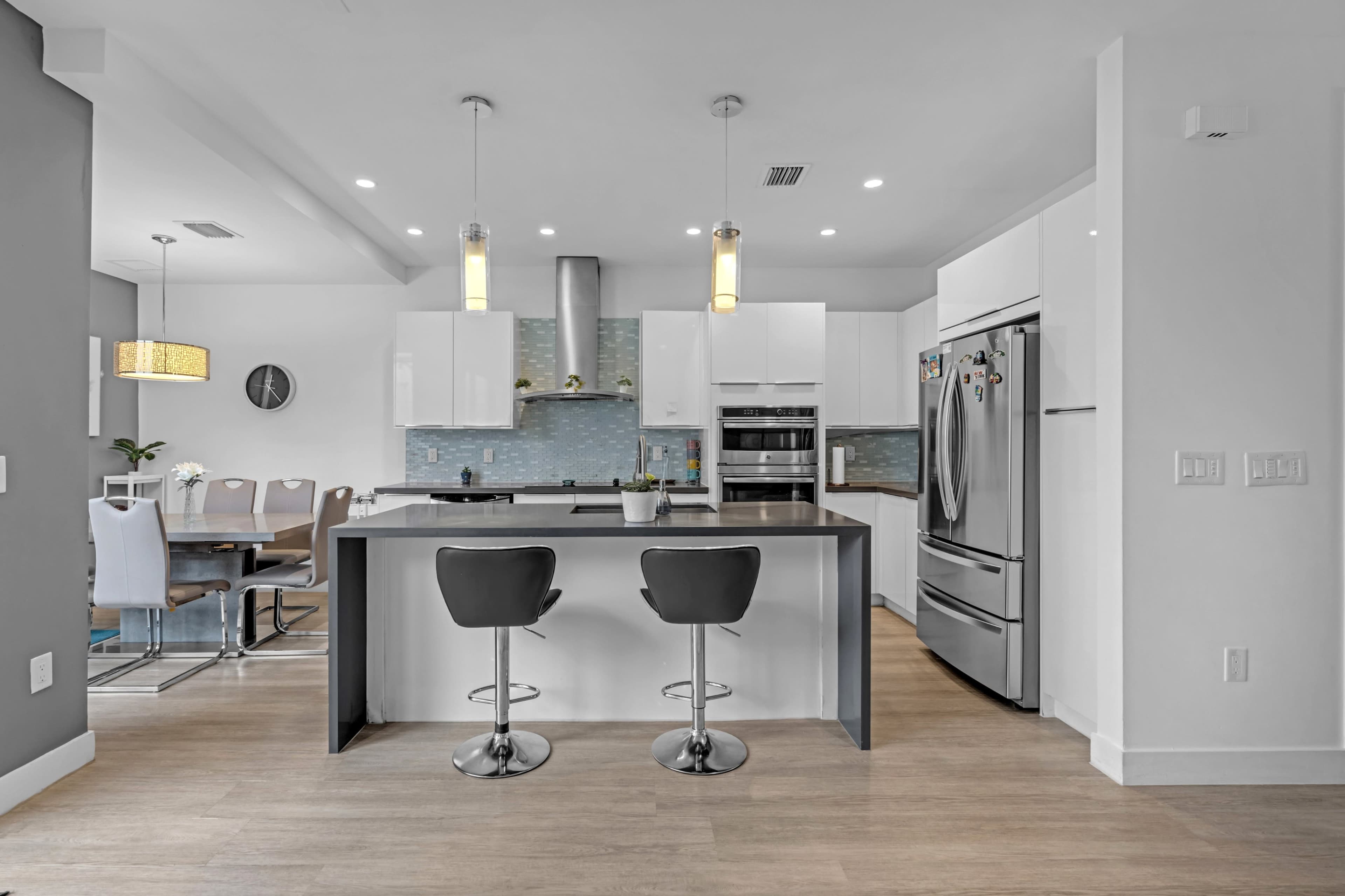 Sky-view Terrace with summer kitchen and mini fridge, four patios in different environments Image in Doral, Doral, FL