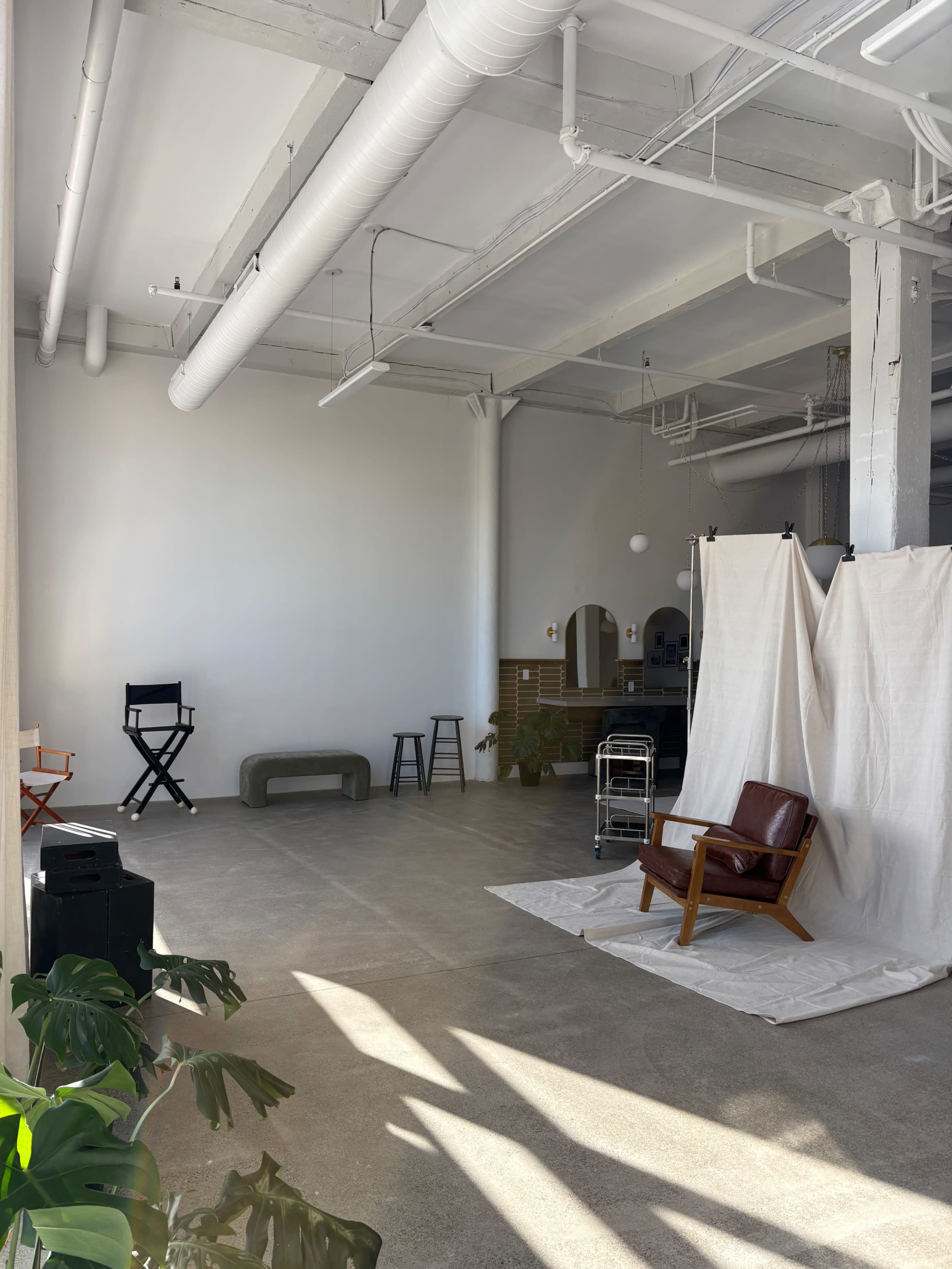 Light drenched, industrial styled photo studio in downtown Buffalo Image in Perry, Buffalo, NY