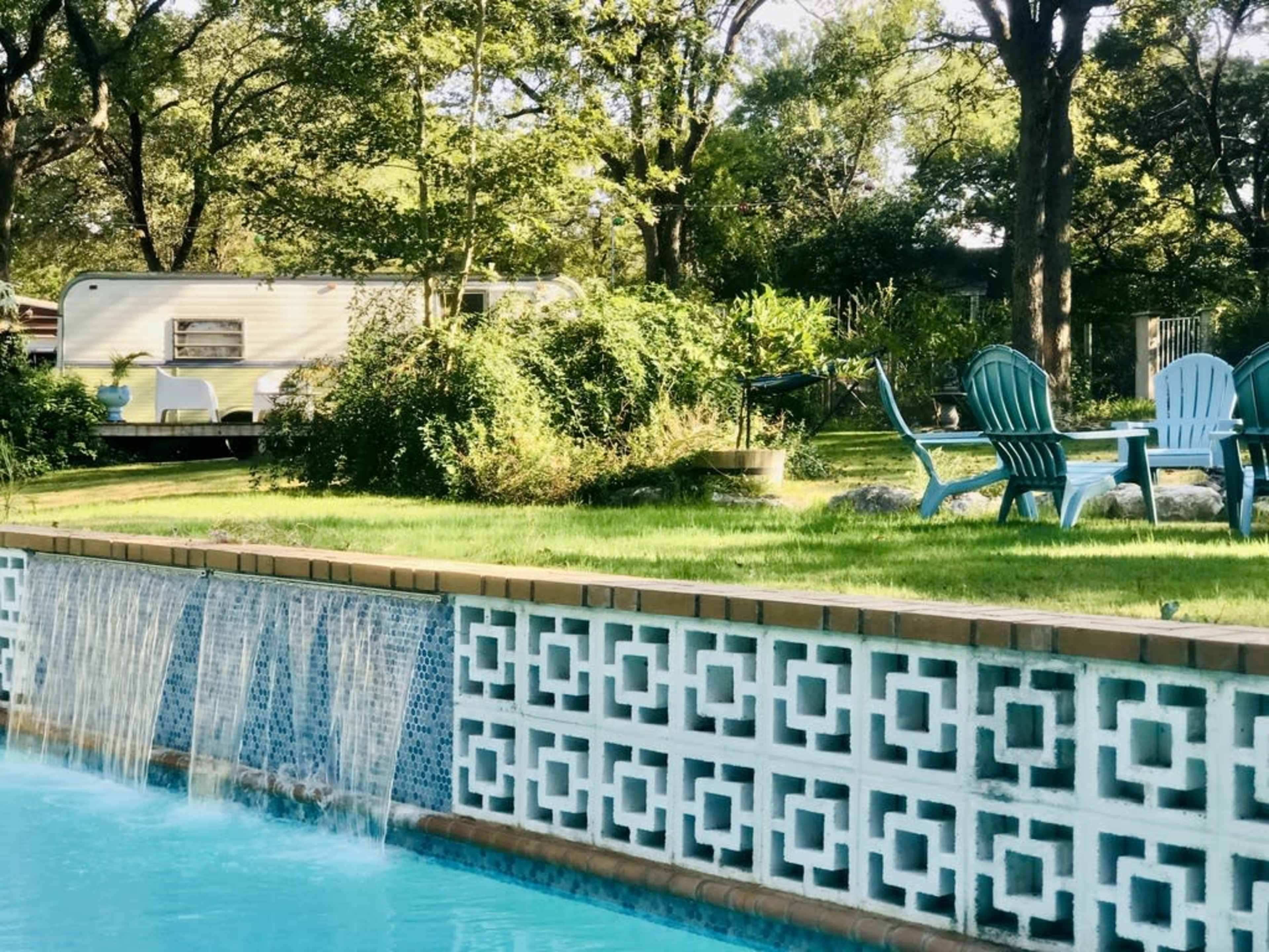 An Eclectic "Austin-tatious"  Large Retro Pool and Gameroom in a spacious private Southwest Austin country setting. Image in Oak Hill, Austin, TX