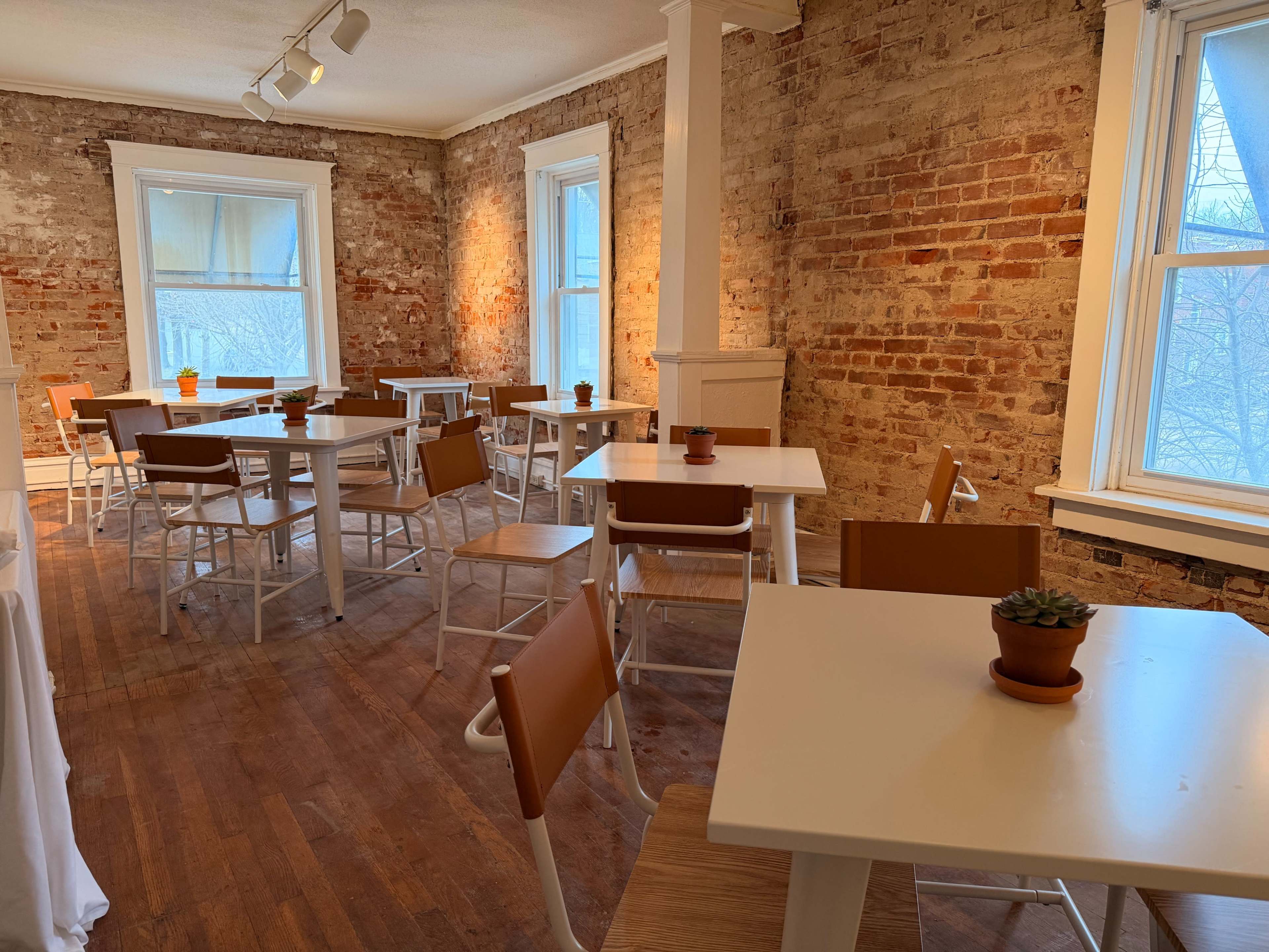 Cozy Upstairs Meeting Space with Lunch Options Downstairs Image in Hadley Township, Maplewood, MO