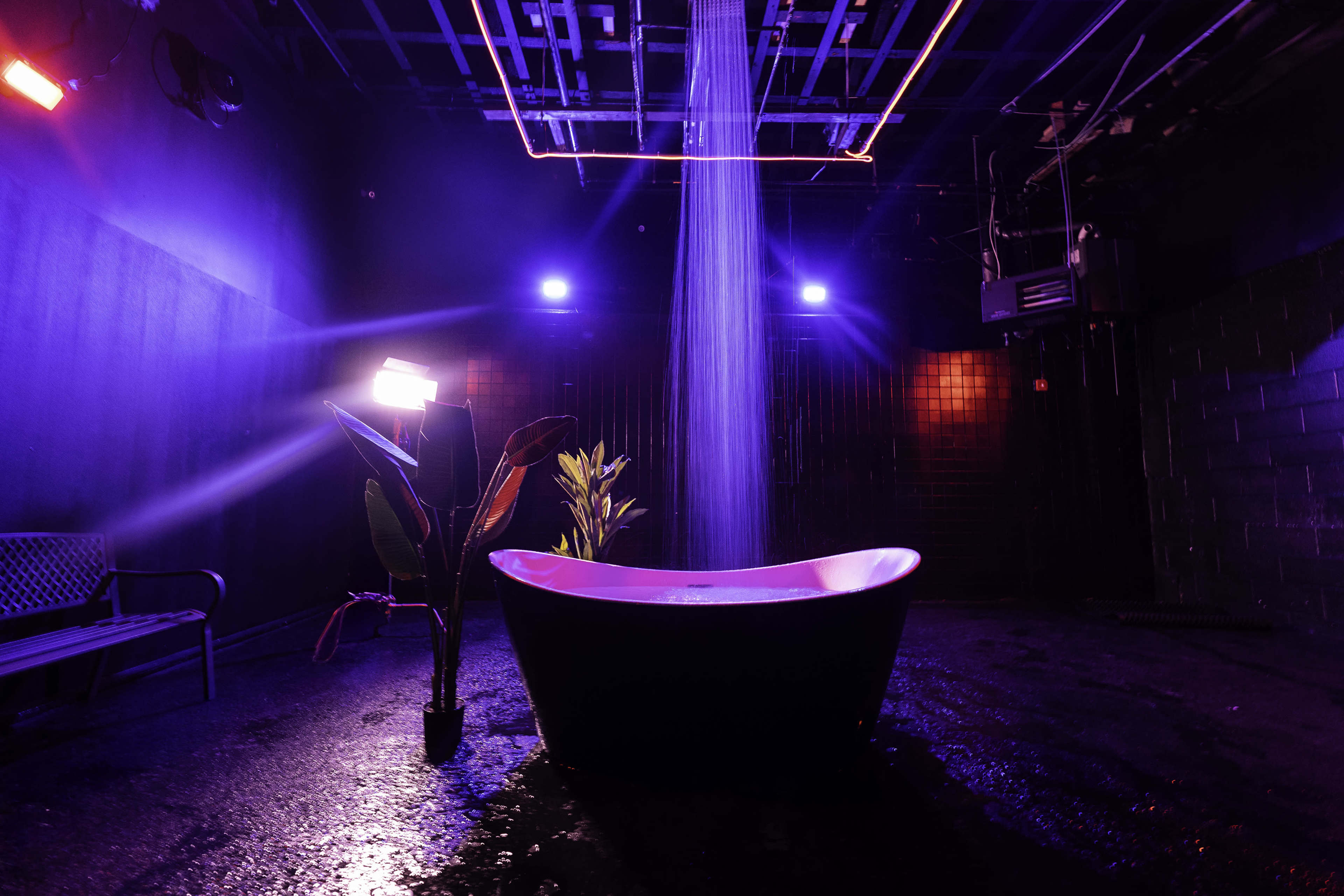 The famous Rain room features several different rain options and pre-installed RGB lights. Image in East Williamsburg, Brooklyn, NY