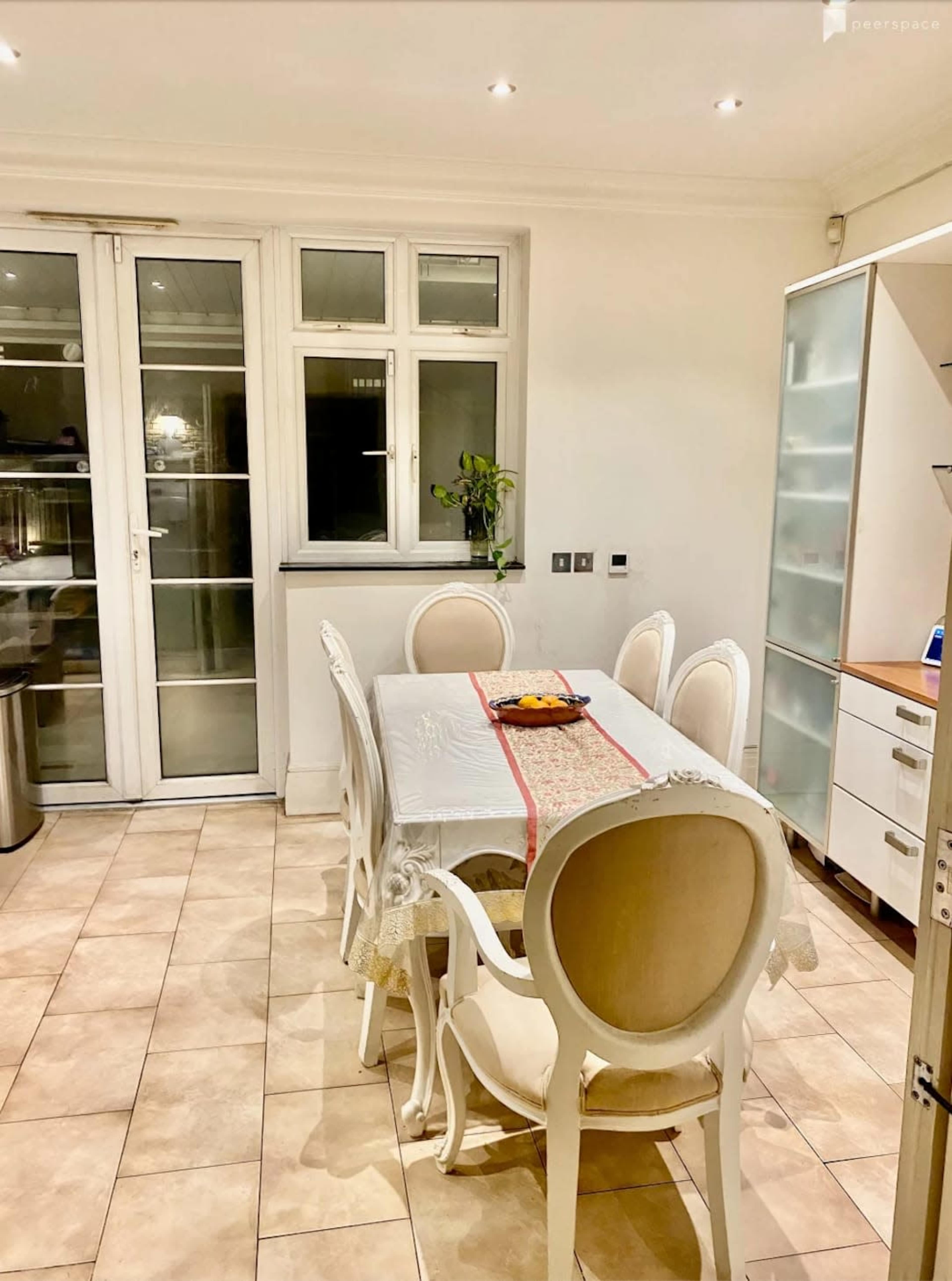 Beautiful townhouse-with fountains, bridges, ponds and green gardens outside Image in Kew, Richmond