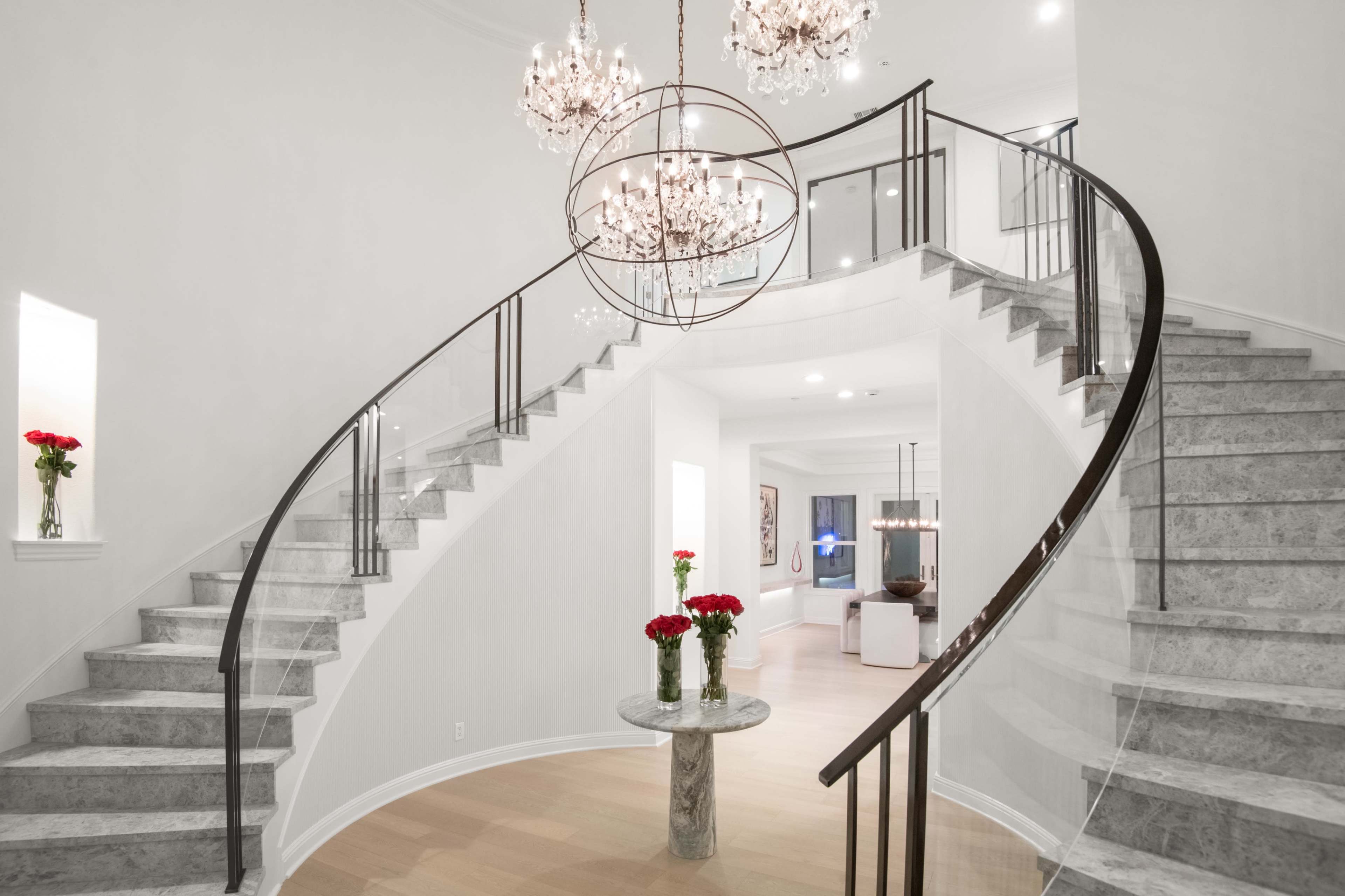 MODERN CHIC, WHITE WALLS, GLASS ENTRY DOUBLE STAIRCASE, RUBY STONED LEATHER WALLED COCKTAIL BAR FEATURE. Image in Moorpark, Moorpark, CA