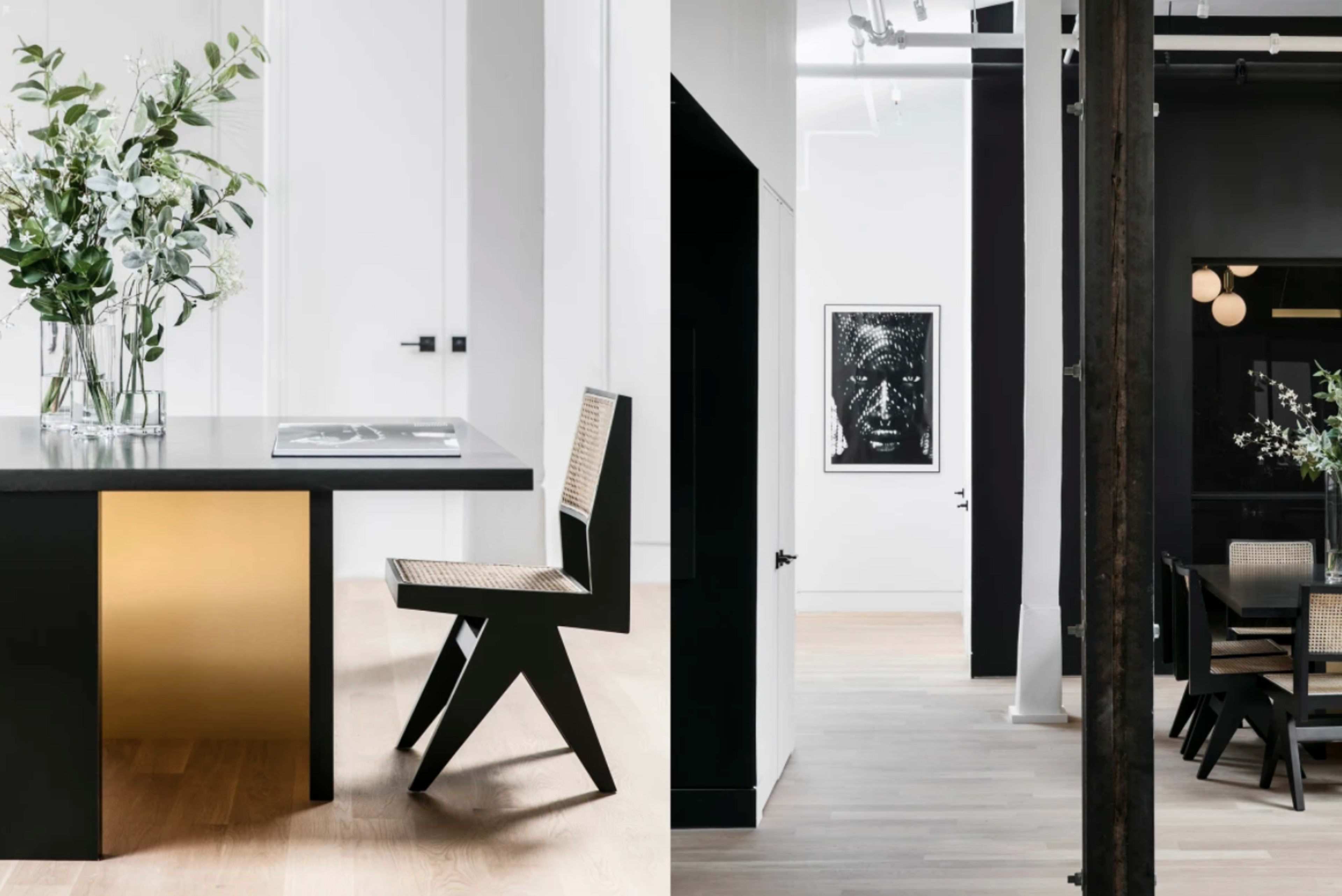 A split scene featuring a modern kitchen area with a sleek table and a chair, and a hallway leading to a room with a framed artwork and minimalist decor.