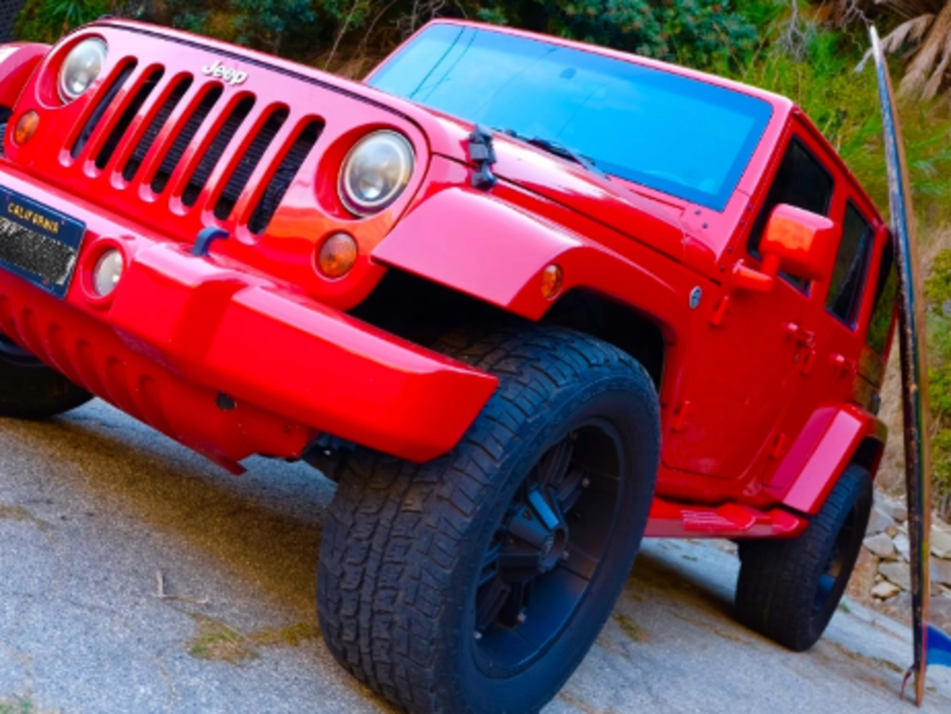 Red Jeep Wrangler Sahara 
