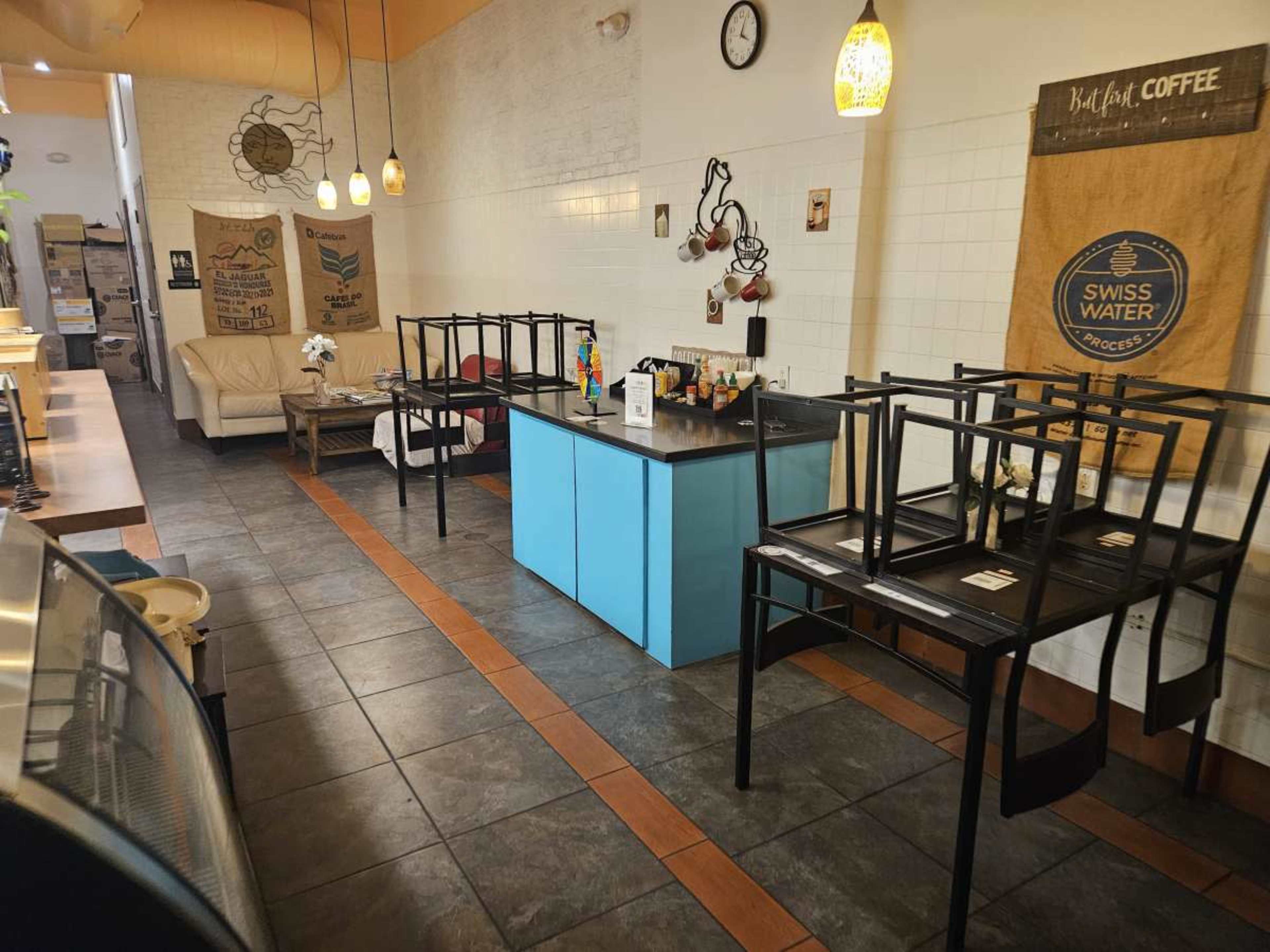 Charming Café Gathering Space with Warm and Inviting Interior Image in Town Of Blake, South Daytona, FL