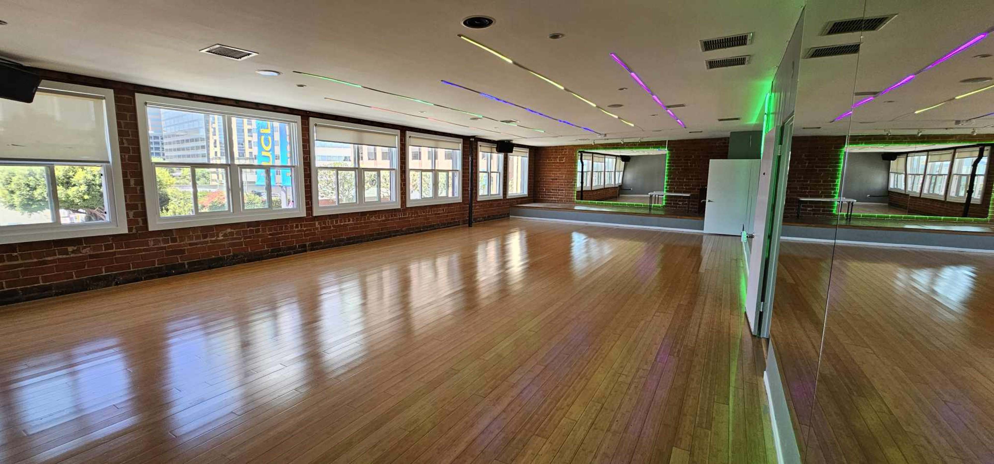 New Dance Studio with red brick walls giving a New York vibe Image in Westwood, Los Angeles, CA
