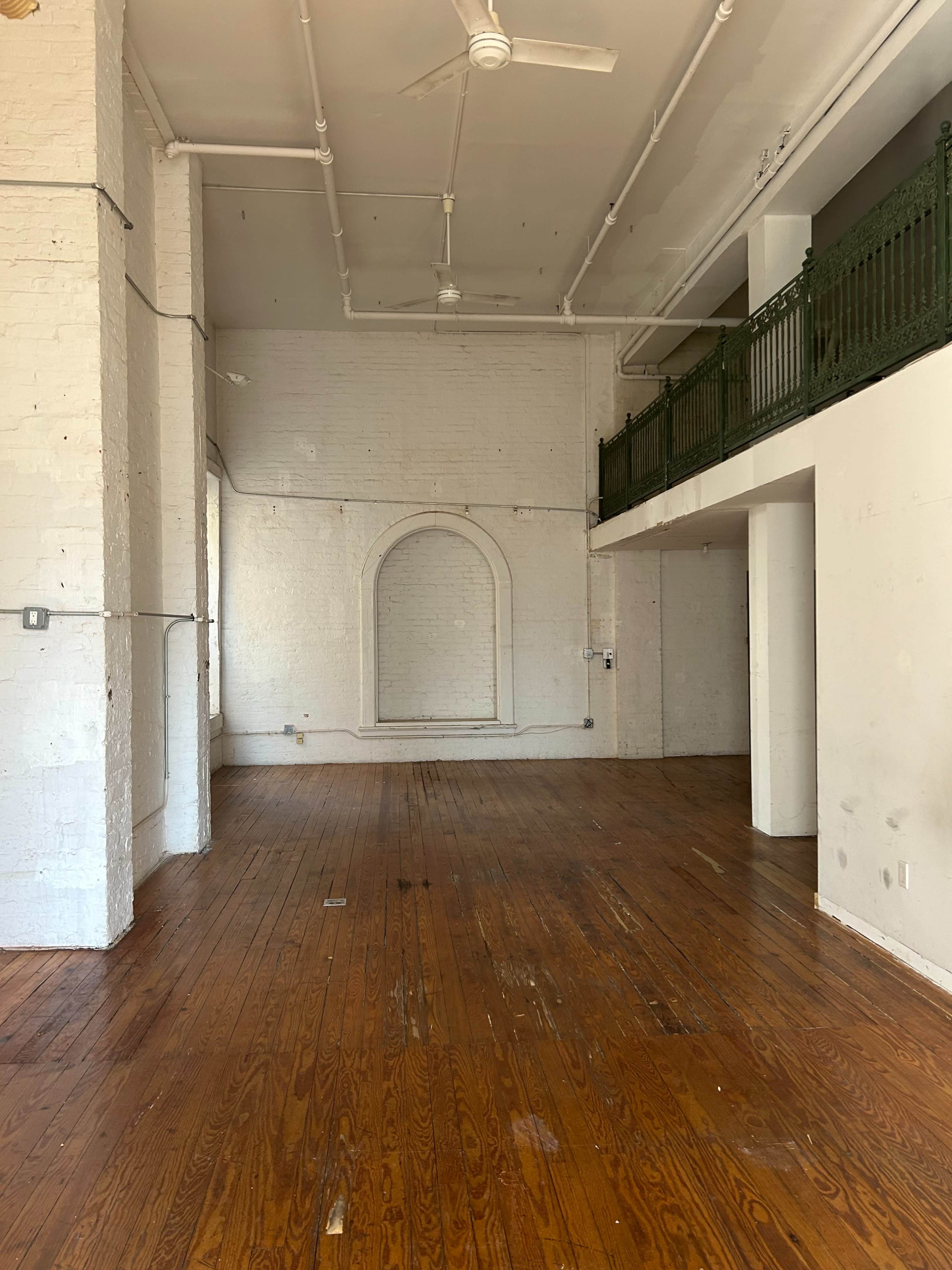 Soho Loft with High Ceilings and White Brick Walls Image in Little Italy, New York, NY