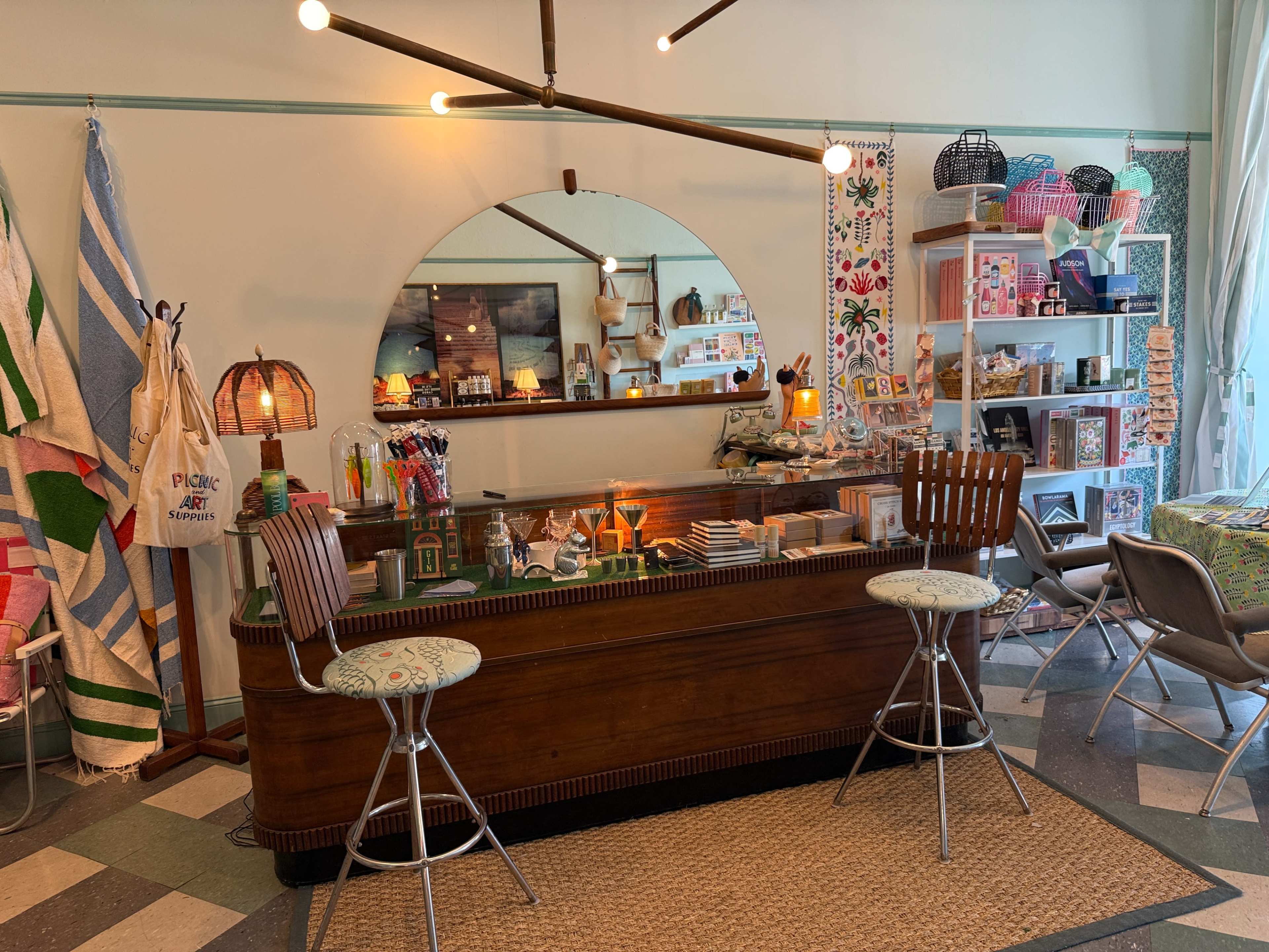 Accidentally Wes Anderson small retail gift shop with timeless feel and rolling ladder Image in Koreatown, Los Angeles, CA