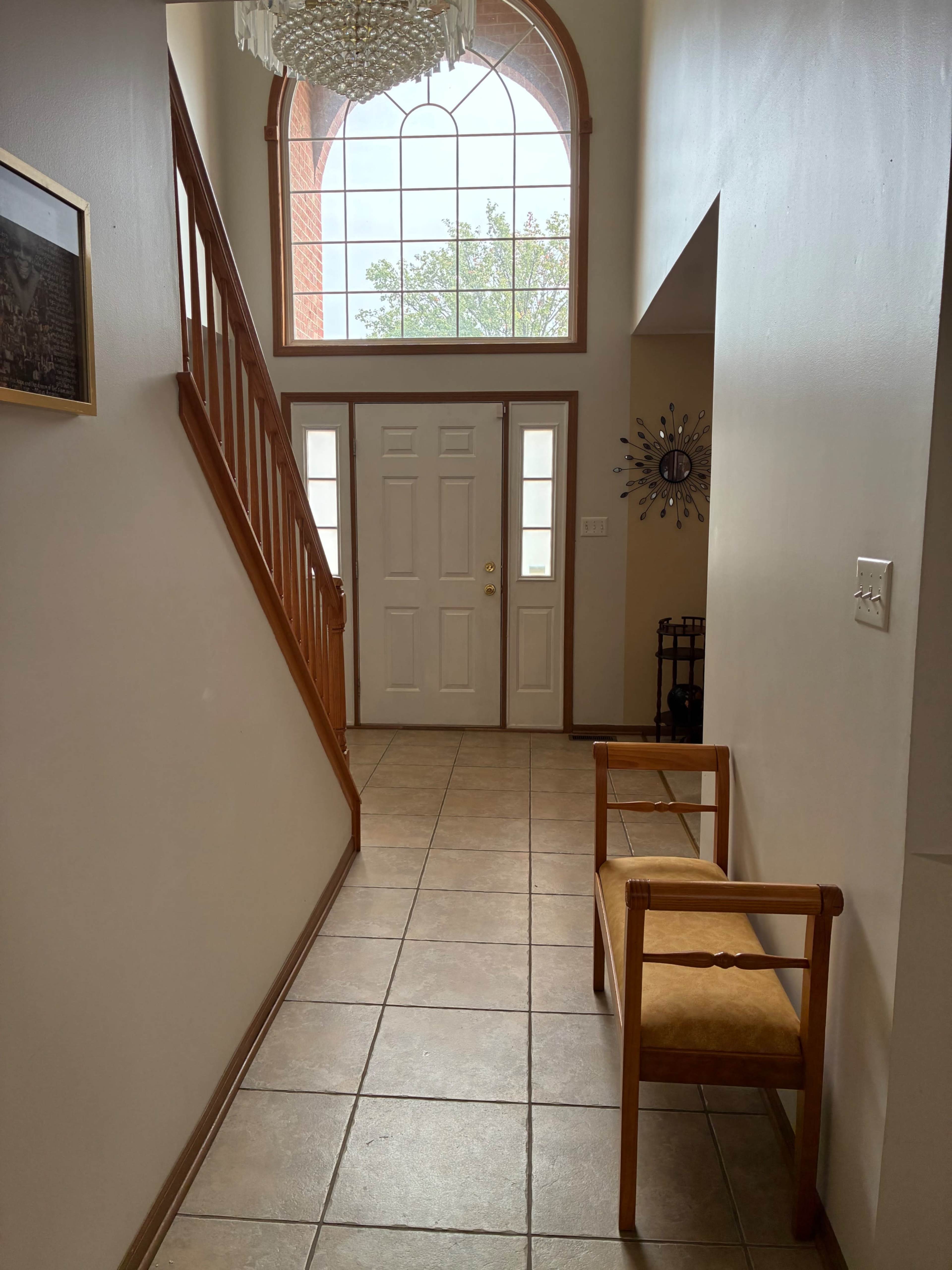suburban open concept great-room and deck with beautiful forest preserve view Image in Thornton Township, South Holland, IL