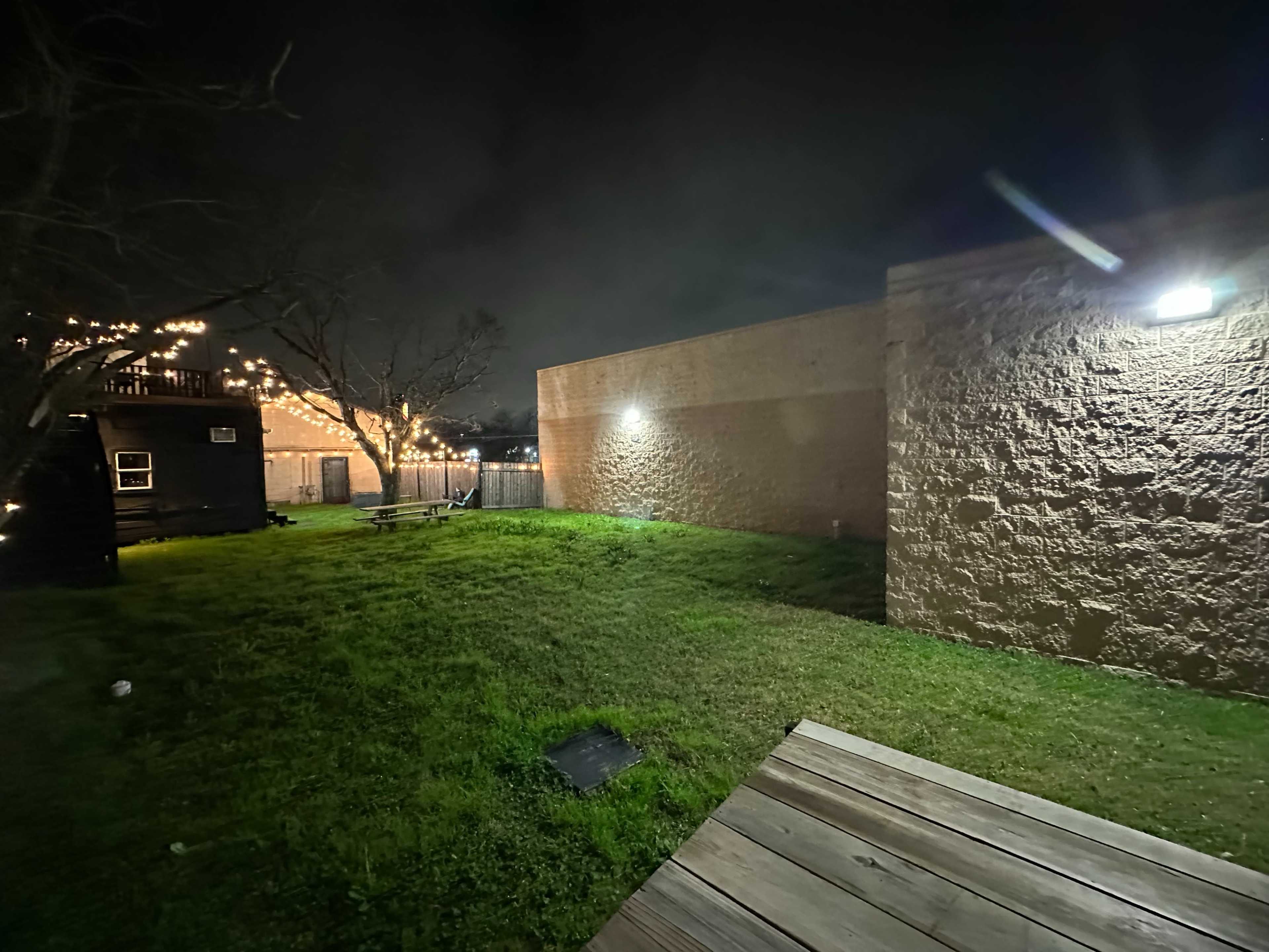 Rooftop Deck with Skyline View and Backyard with Stage Image in Greater Eastwood, Houston, TX
