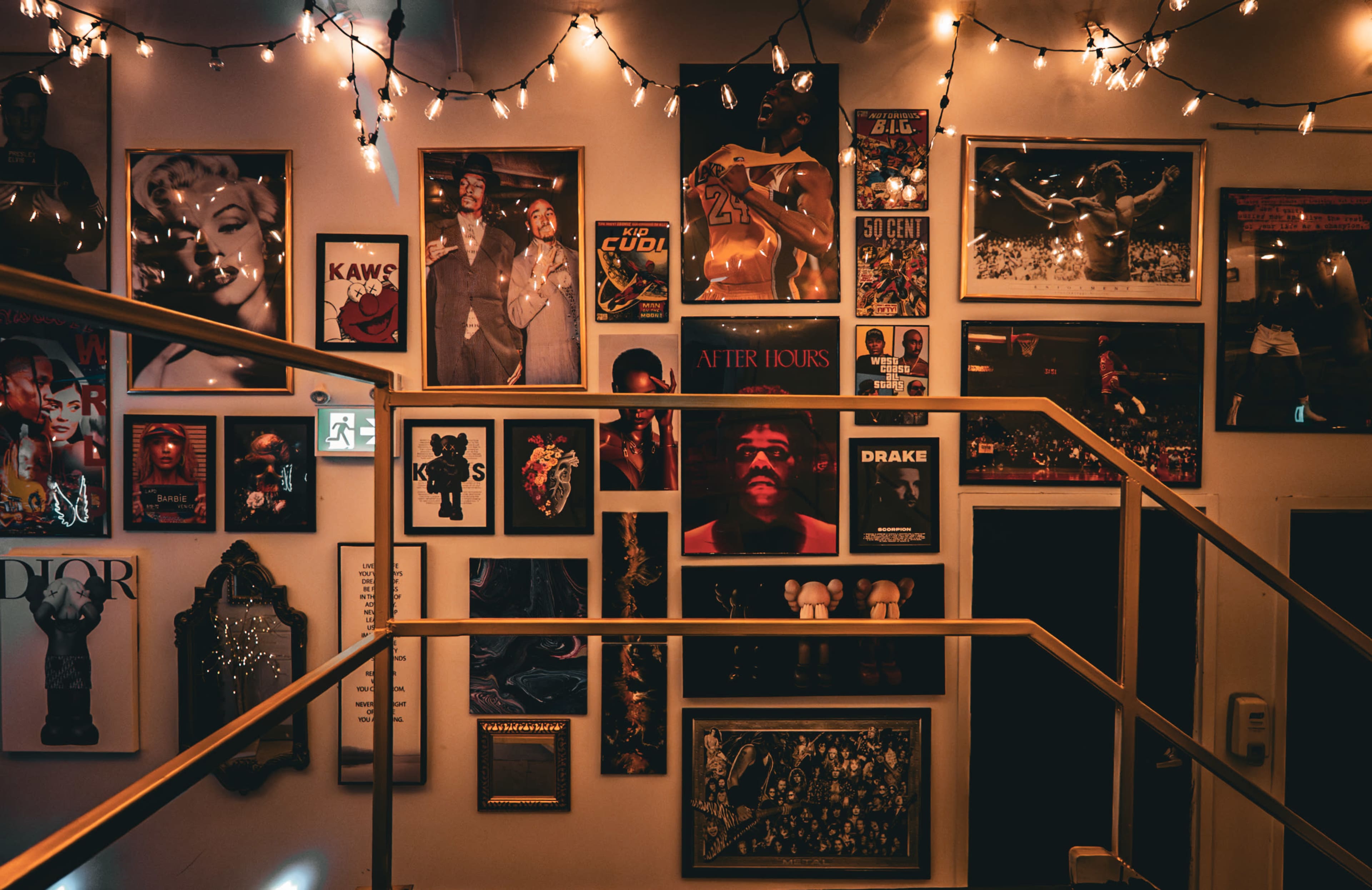The 777 Lobby Photo & Video Studio with Iconic Poster Wall, Gold Railings, Black Staircase, Ceiling Lights Image in Humber Summit, Toronto, ON