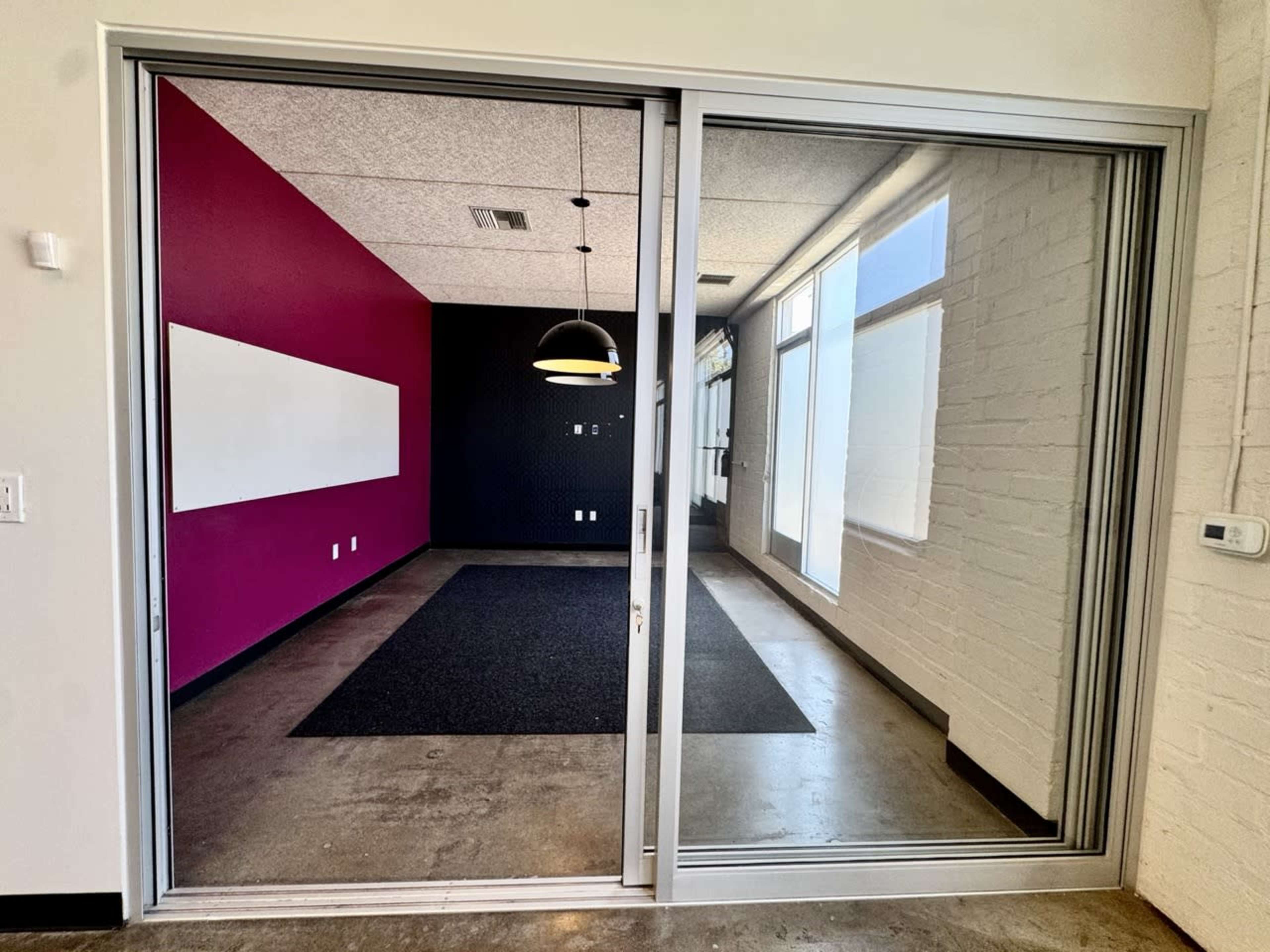 Private, industrial style event room with exterior windows Image in Downtown, Santa Monica, CA