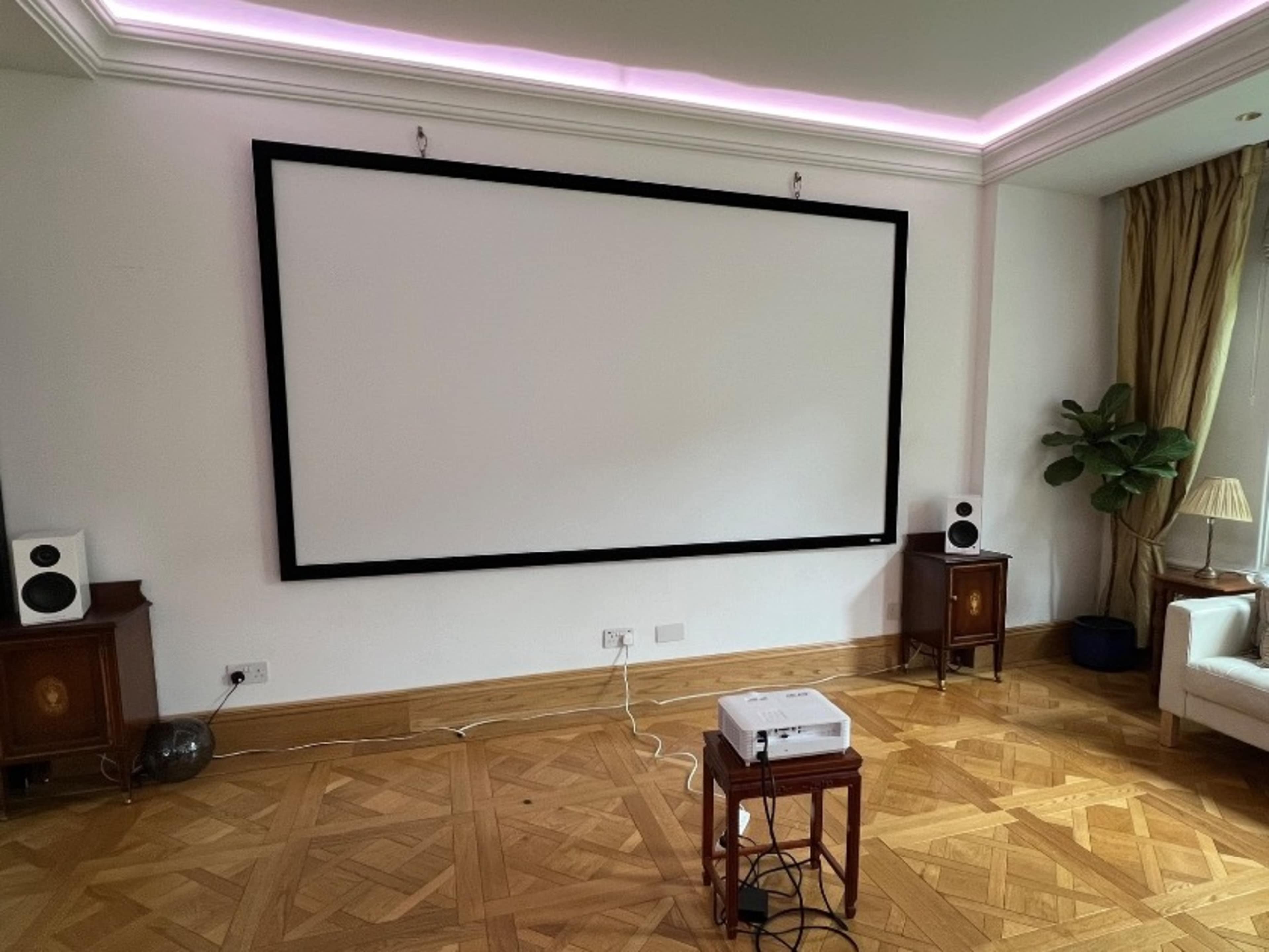 Projector and large screen