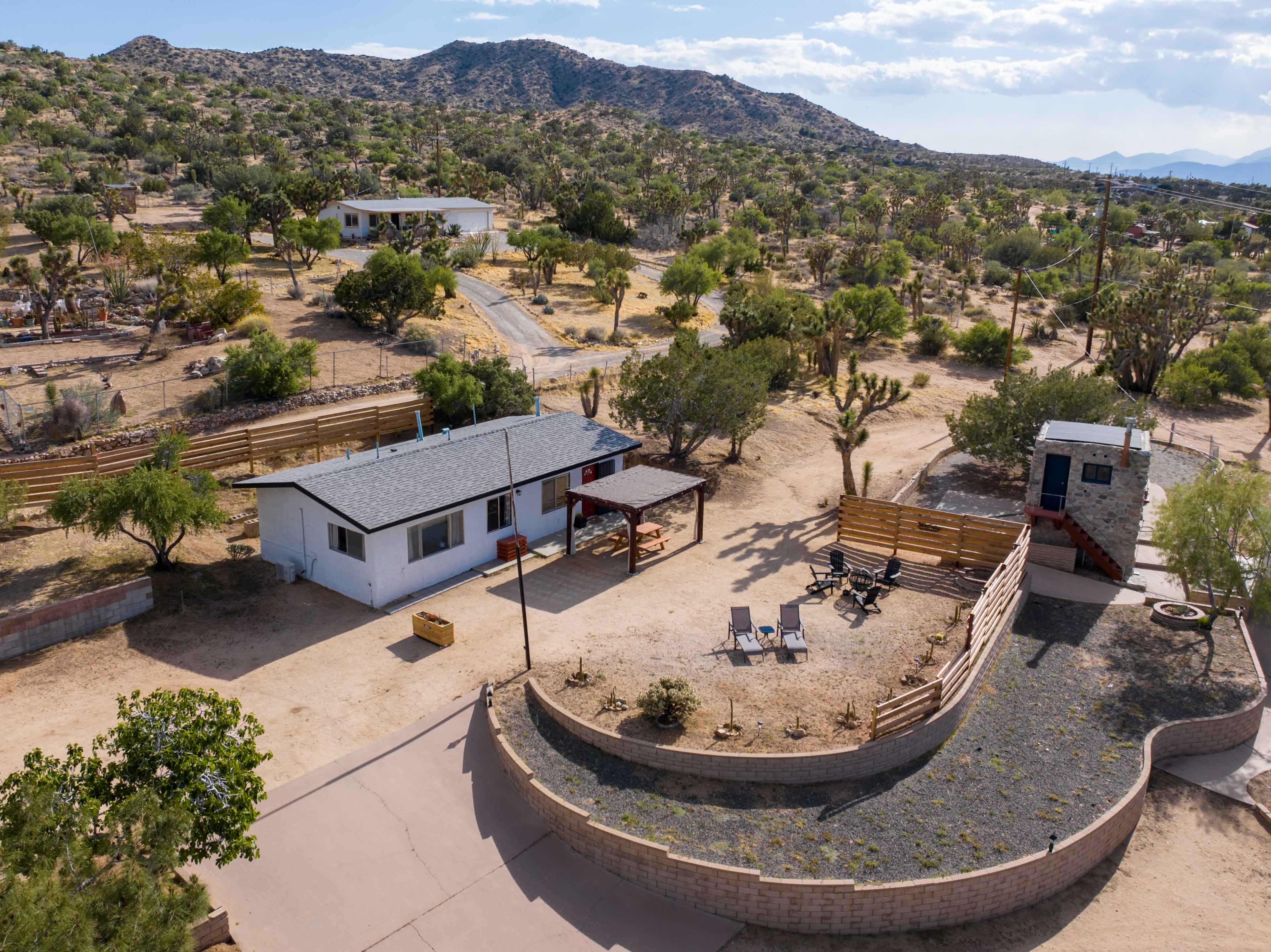Secluded house, casita and rock tower on 3.5 acres of beautiful hillside desert land with joshua trees Image in Yucca Valley, Yucca Valley, CA
