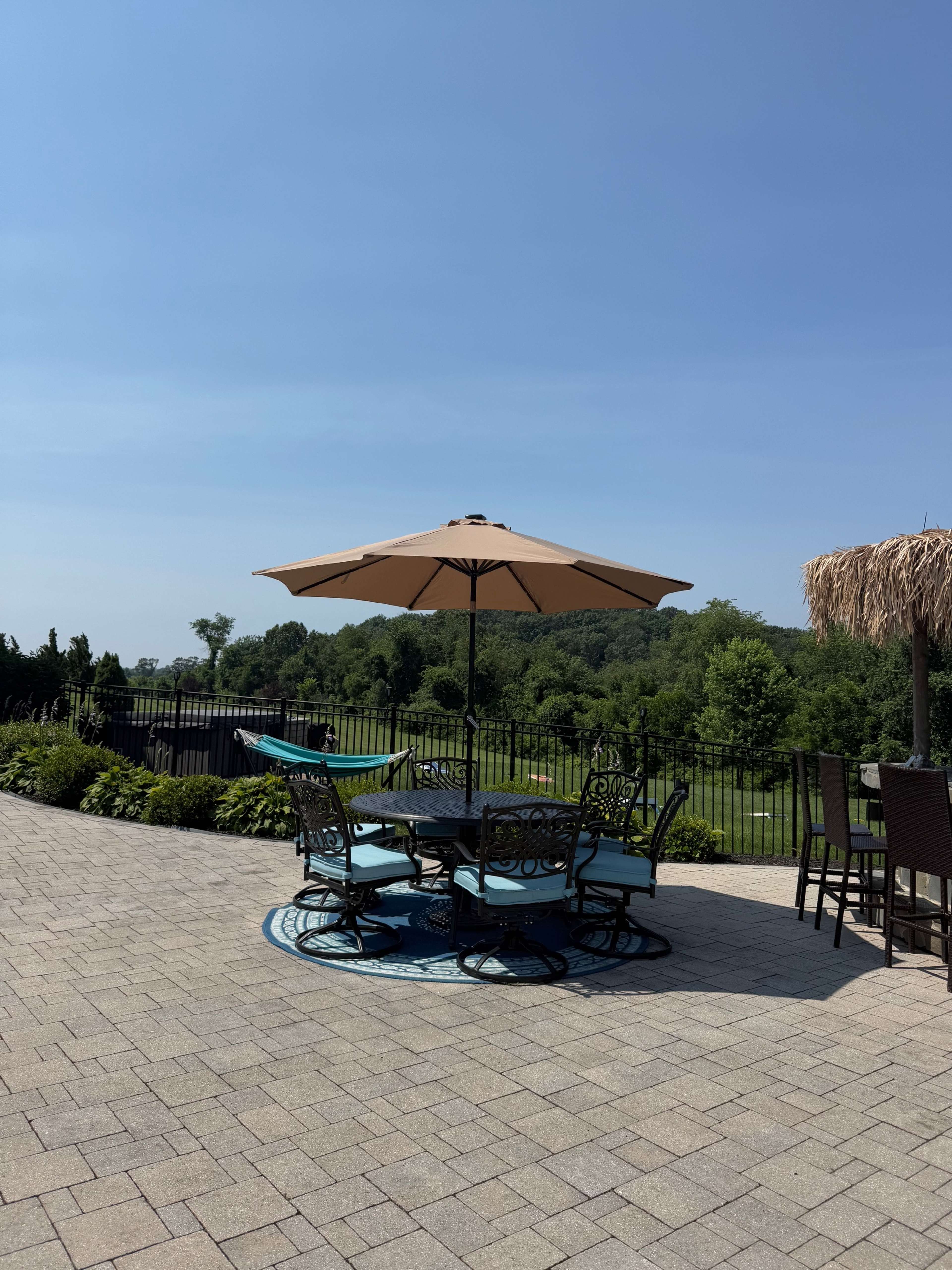 Modern Pool Oasis with Lush Privacy & Designer Lounge Area with Tiki Bar and Resort feel Image in , Westminster, MD