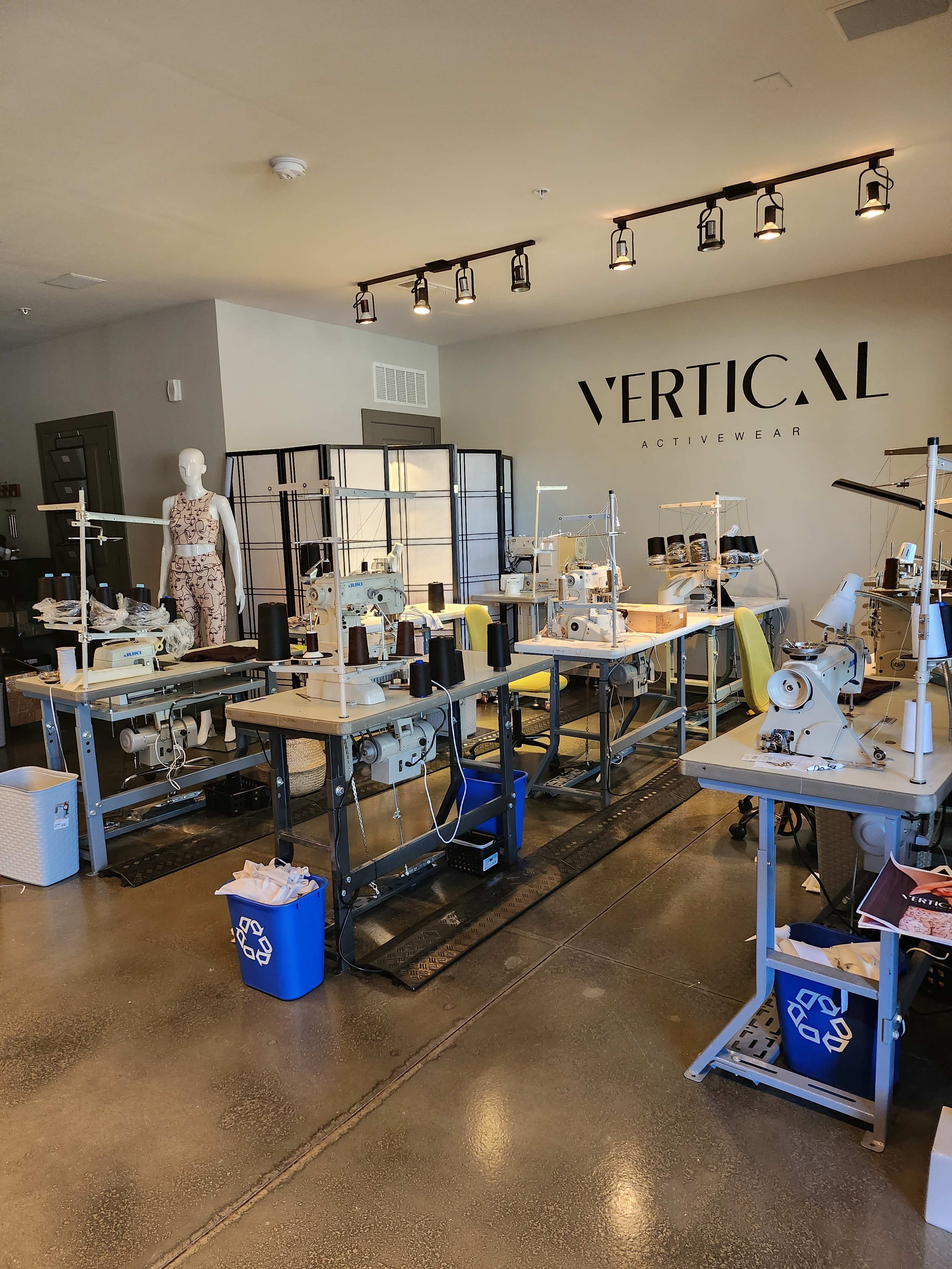 Intimate Sewing Studio with Industrial Machines & Photography Wall Image in Duluth, Duluth, GA