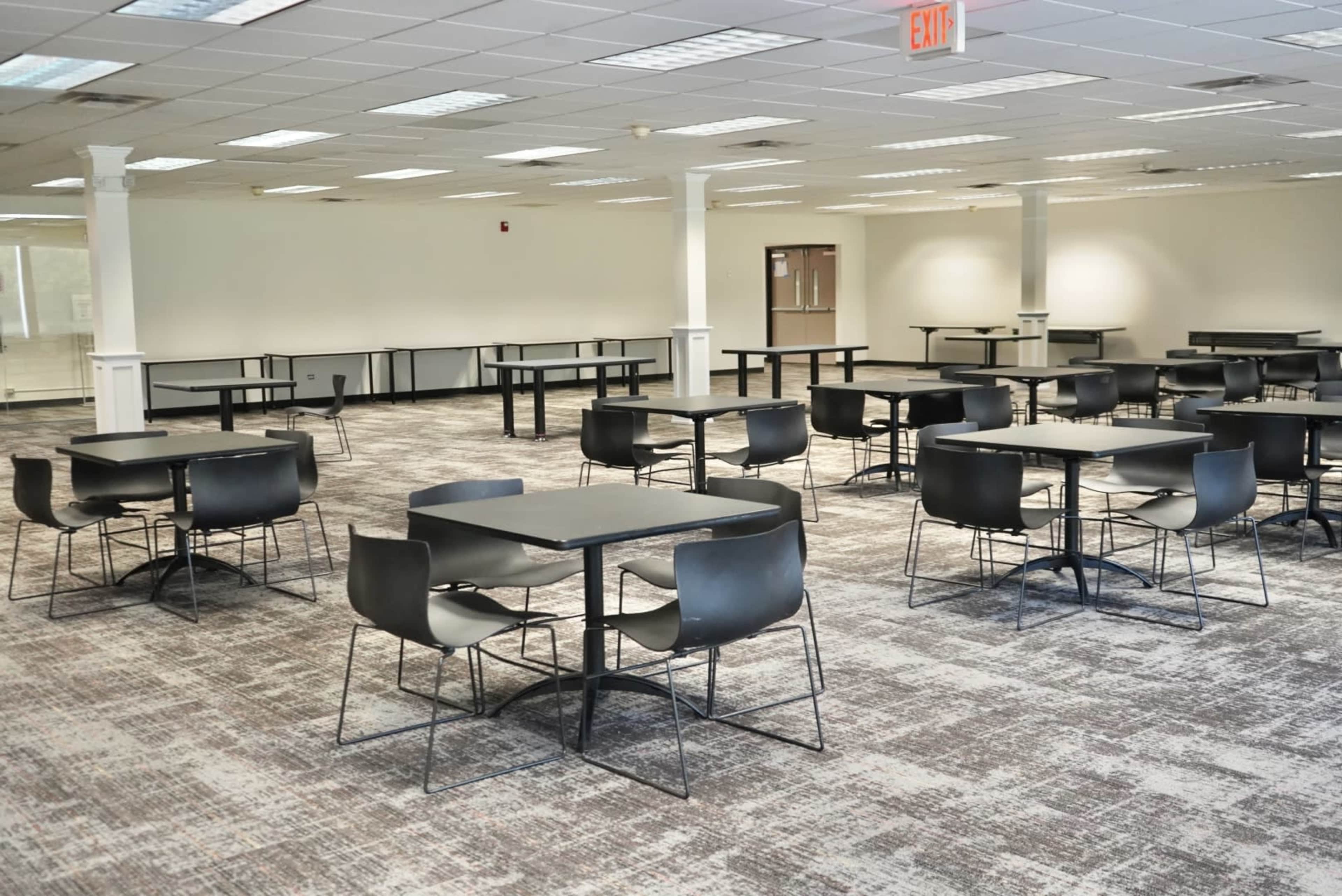 Modern Industrial Elegance: Spacious Venue with Soaring Windows and Natural Light Image in Bloom Township, Chicago Heights, IL