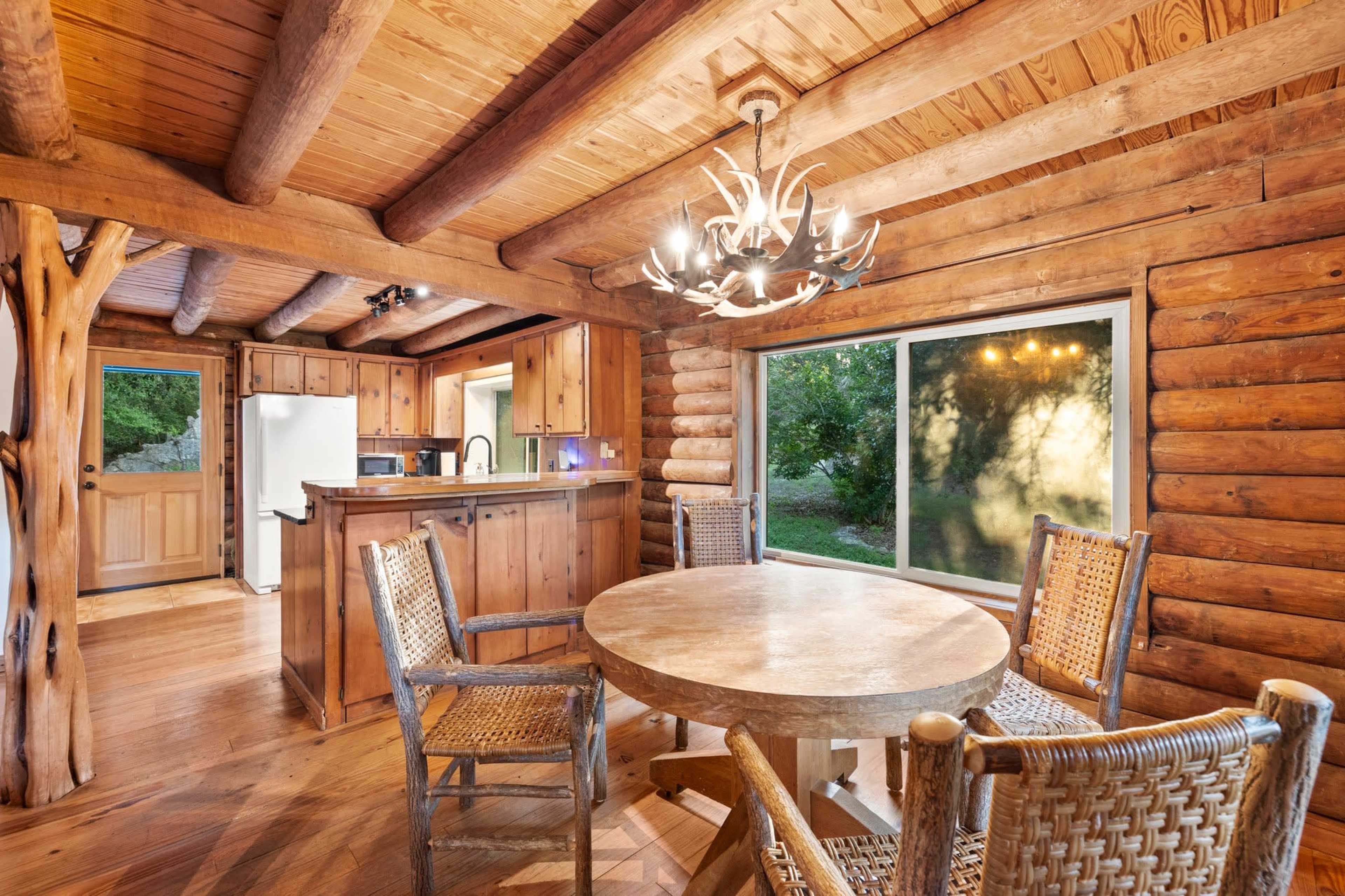 Rustic Secluded Log Cabin in the Austin Hill Country Image in , Austin, TX