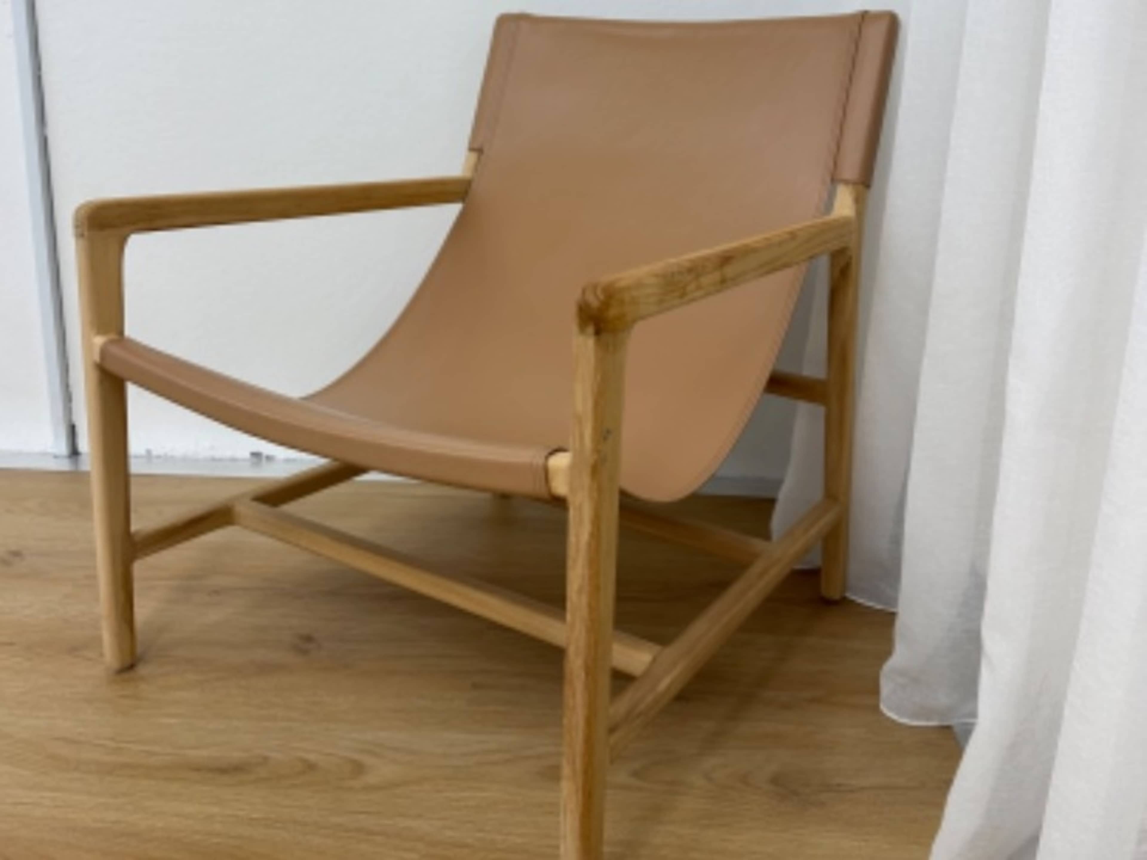 Tan sling leather chair 