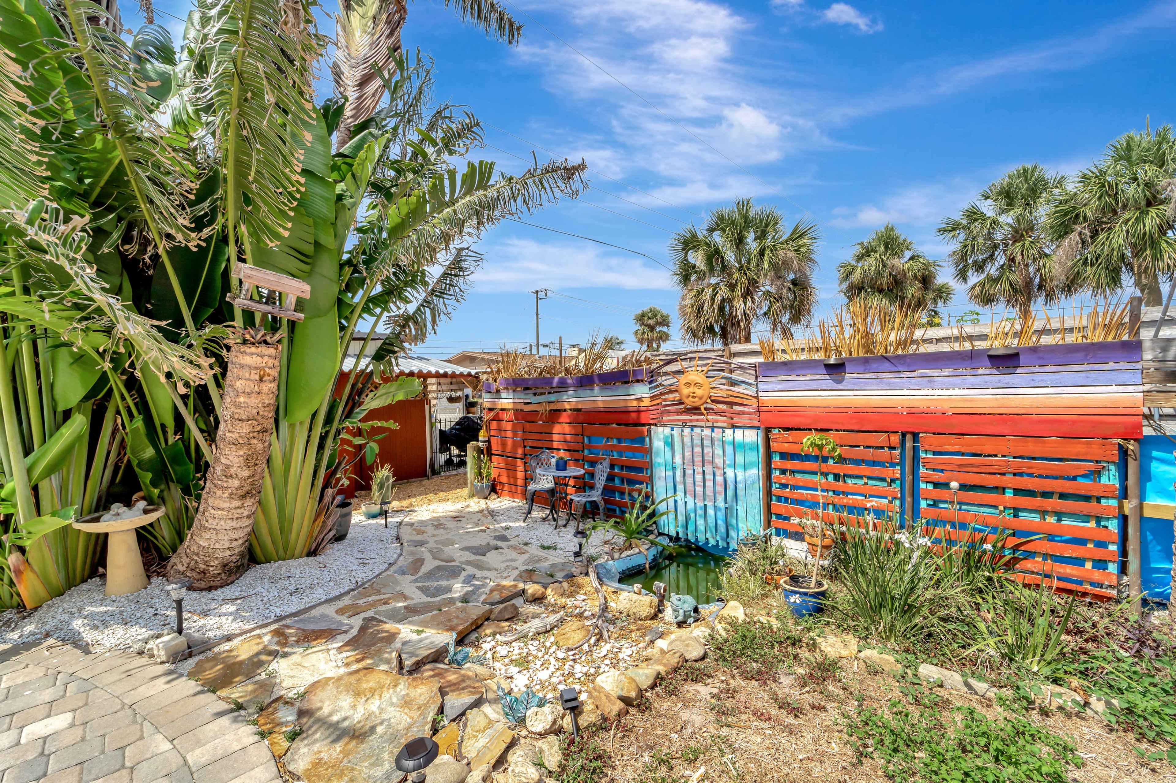 Coastal community tropical garden micro-resort w/ private lagoon pool + tiki bar + garden/dining  + outdoor kitchen Image in South Venice, South Venice, FL