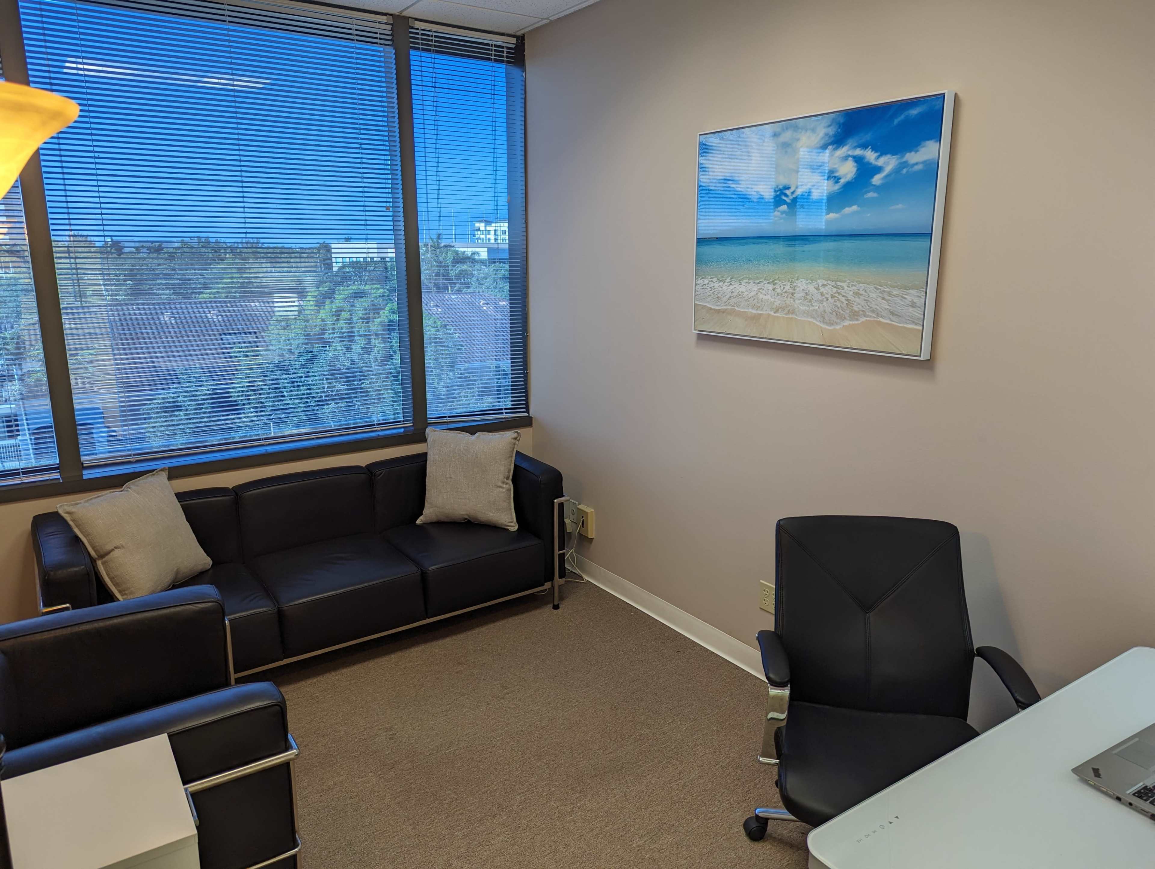 Just outside the downtown area. Large conference room with a smaller office connected by a glass door. Located within a quiet Psychologist's office. Image in West Palm Beach, West Palm Beach, FL