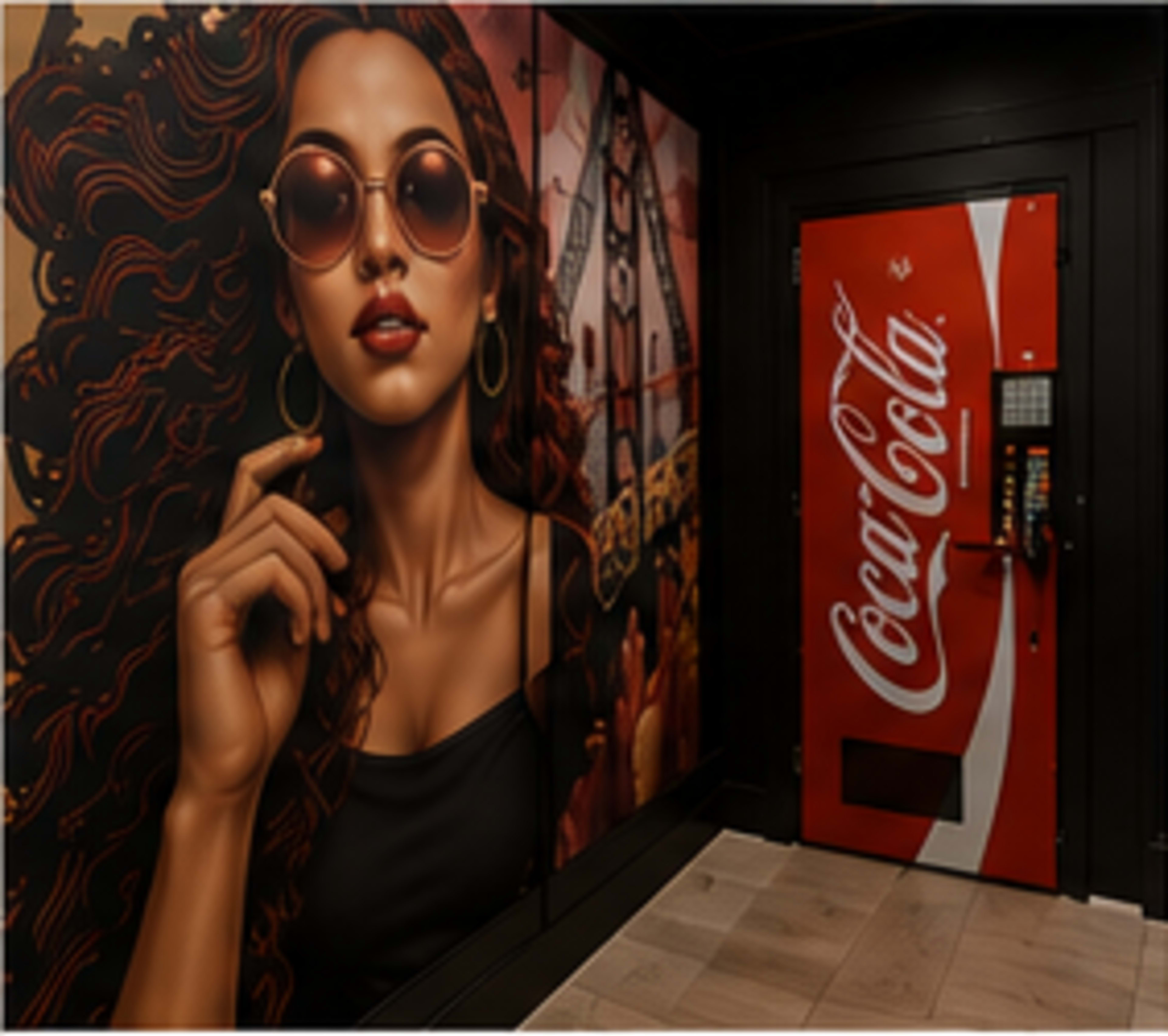 The image features a vibrant mural of a woman with sunglasses on a wall, next to a bright red Coca-Cola vending machine.