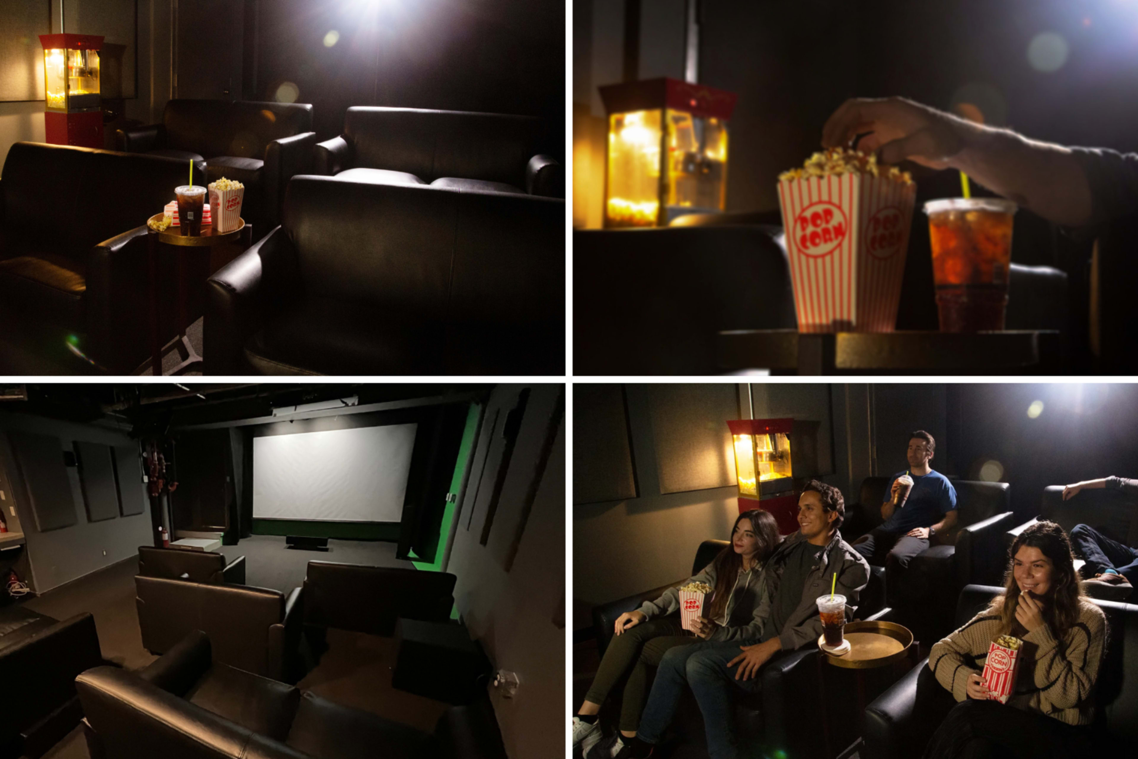 A private movie theater with comfortable seating, a popcorn machine, and individuals enjoying snacks in front of a large screen.